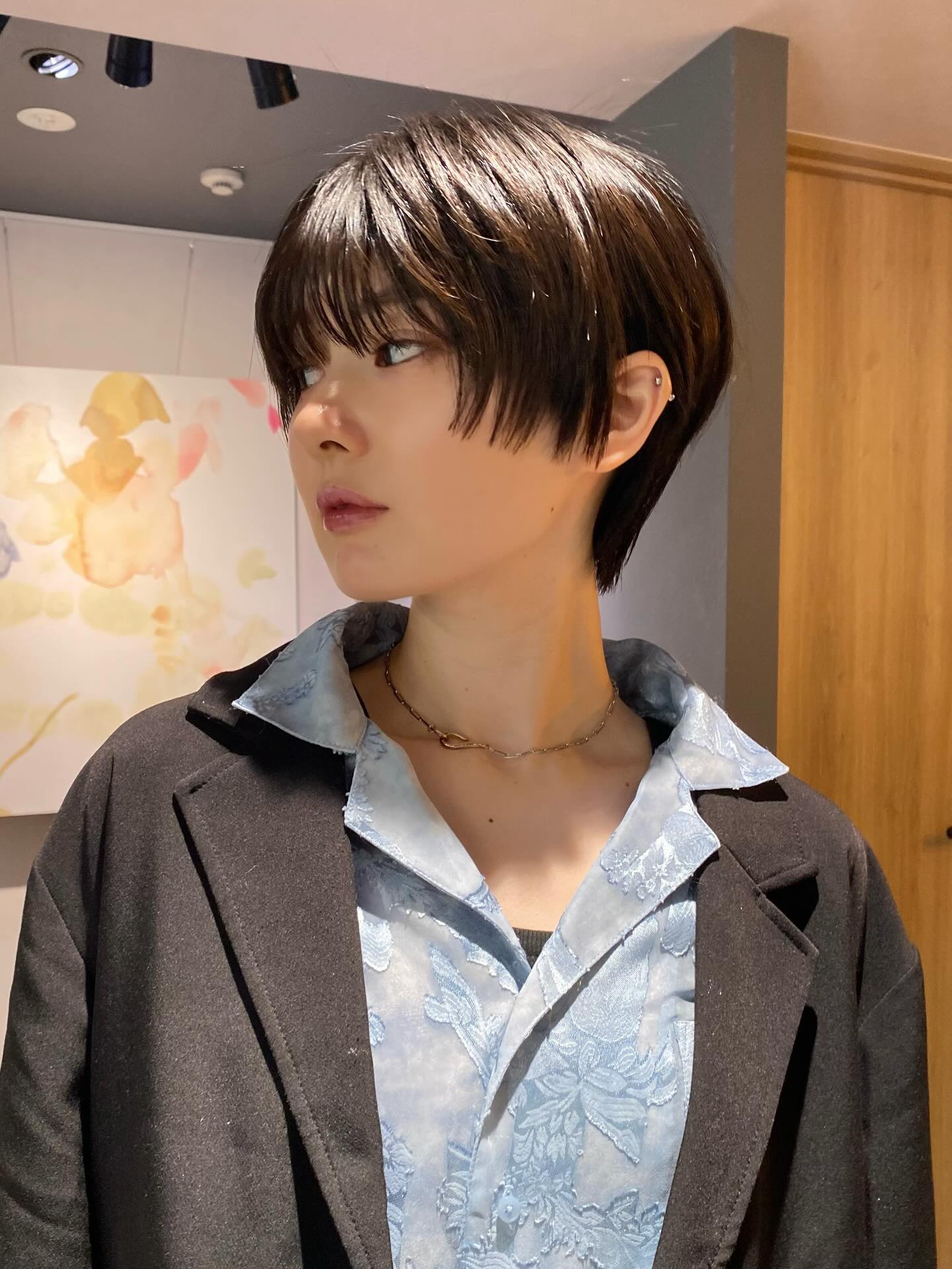 Short dark brunette textured crop with choppy fringe