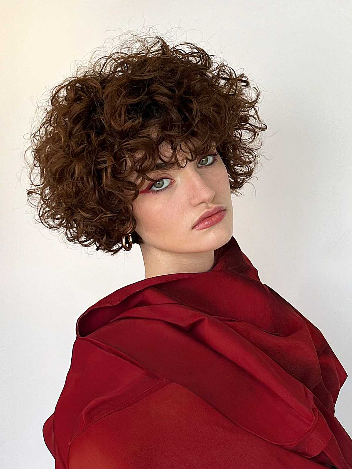 Short Voluminous Curly Bob in Warm Chestnut Brown