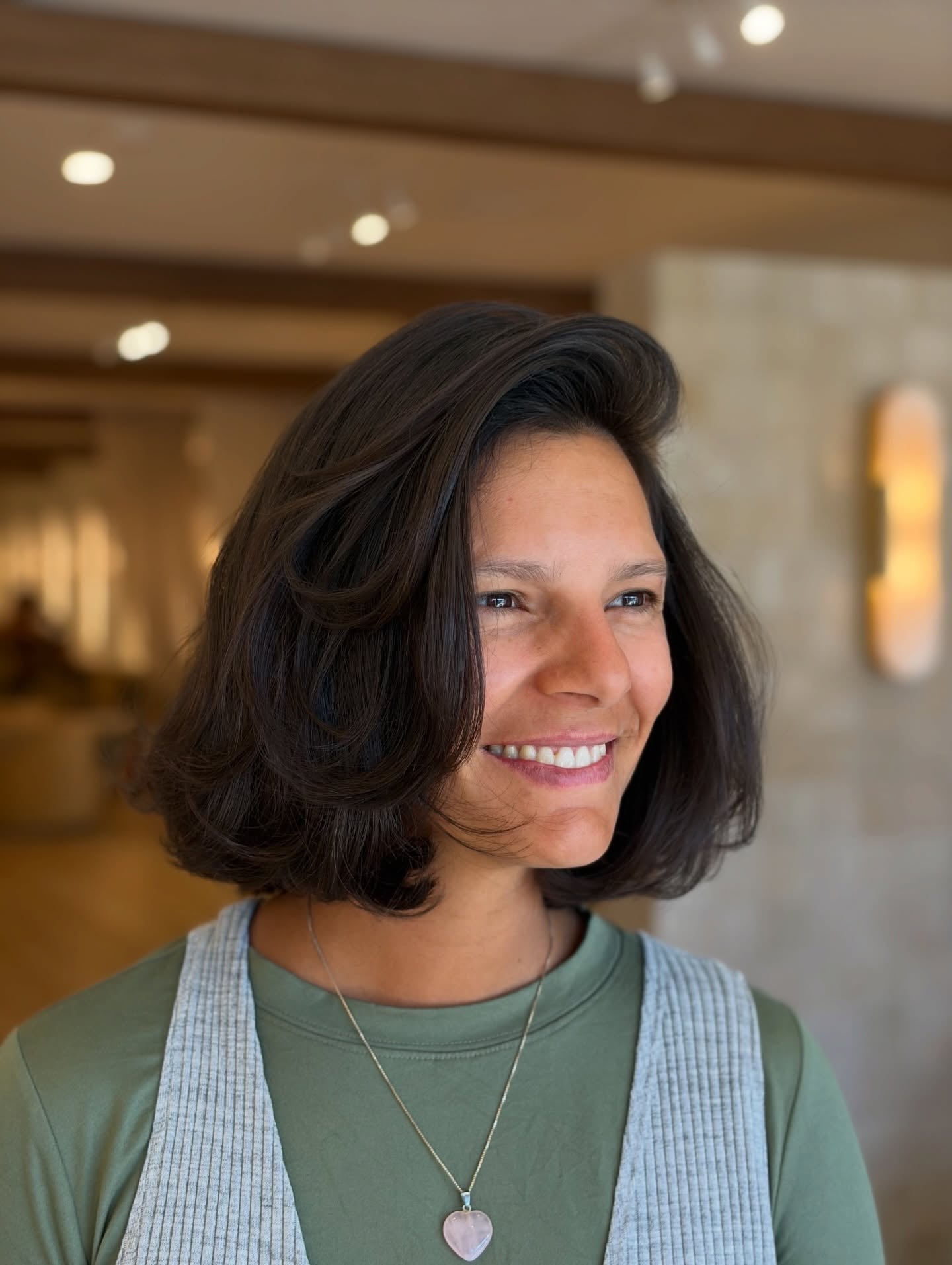 Dark brunette bob with volume and flipped-out ends