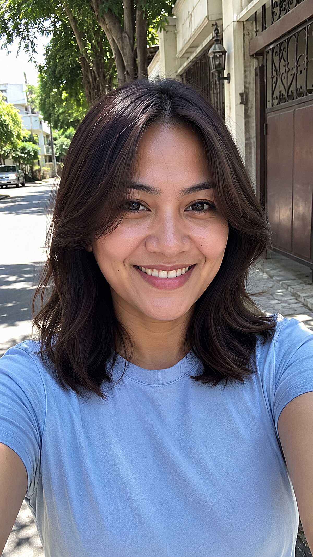 Casual brunette shoulder-length hair with grown-out bangs