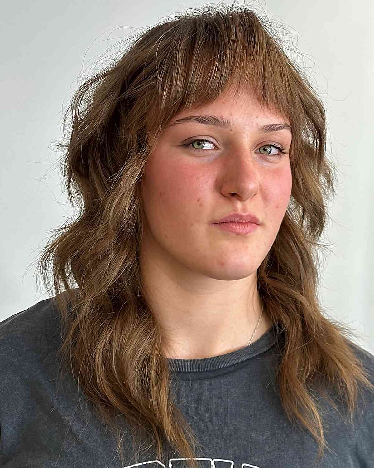 Textured Mullet Hairstyle with Bangs