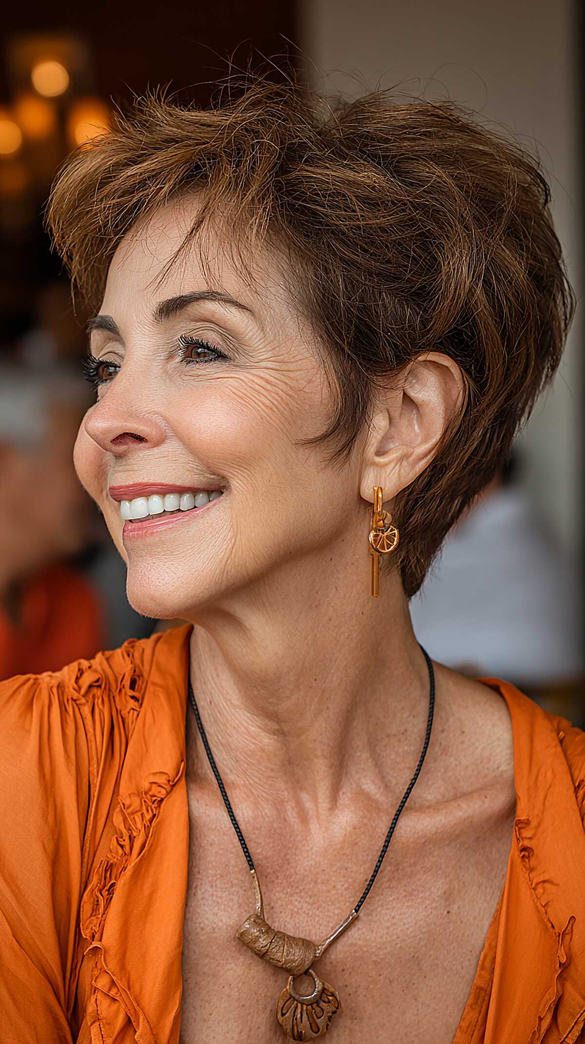 Tousled brunette pixie wedge with choppy texture