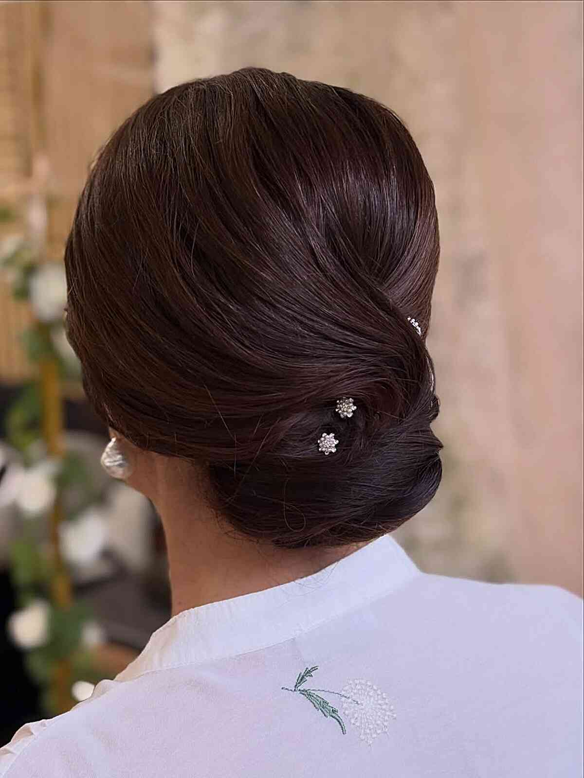 Elegant Chignon with Subtle Accessories