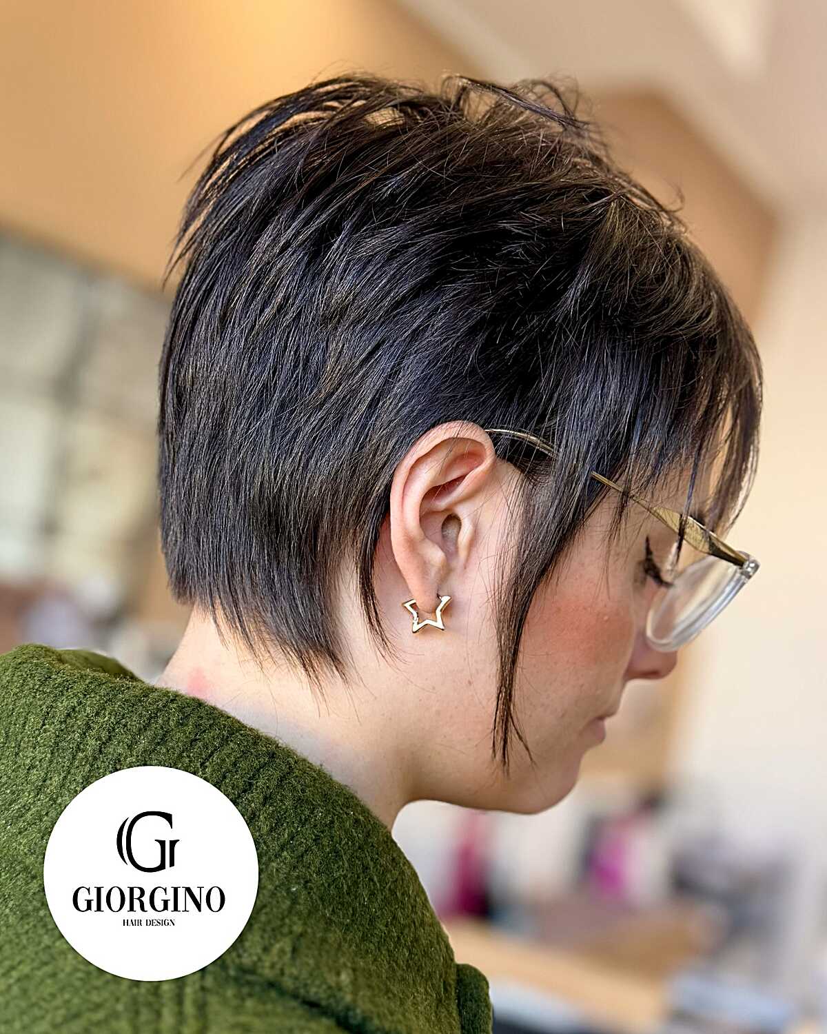 Dark brown tapered pixie with piecey textured top