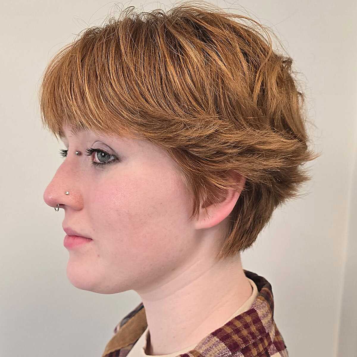 Ginger copper layered pixie shag with wispy fringe