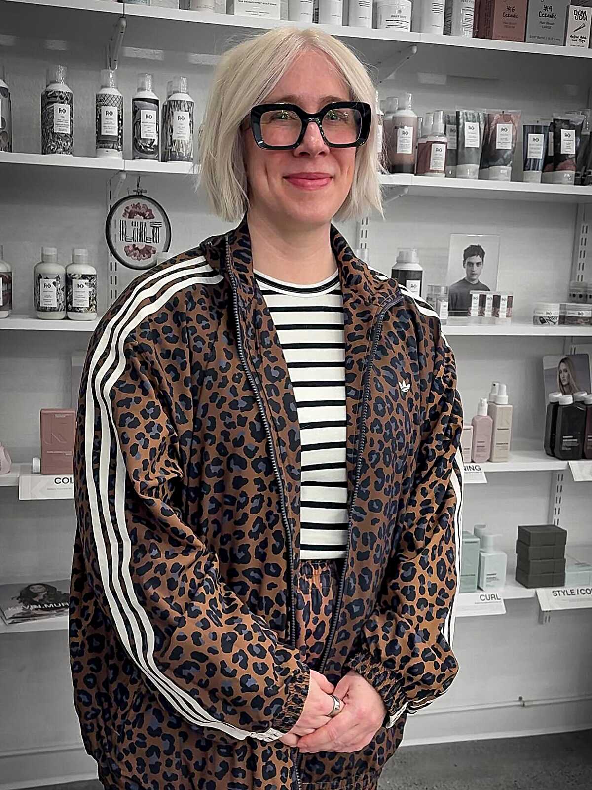 Chin-length platinum blonde bob with center part