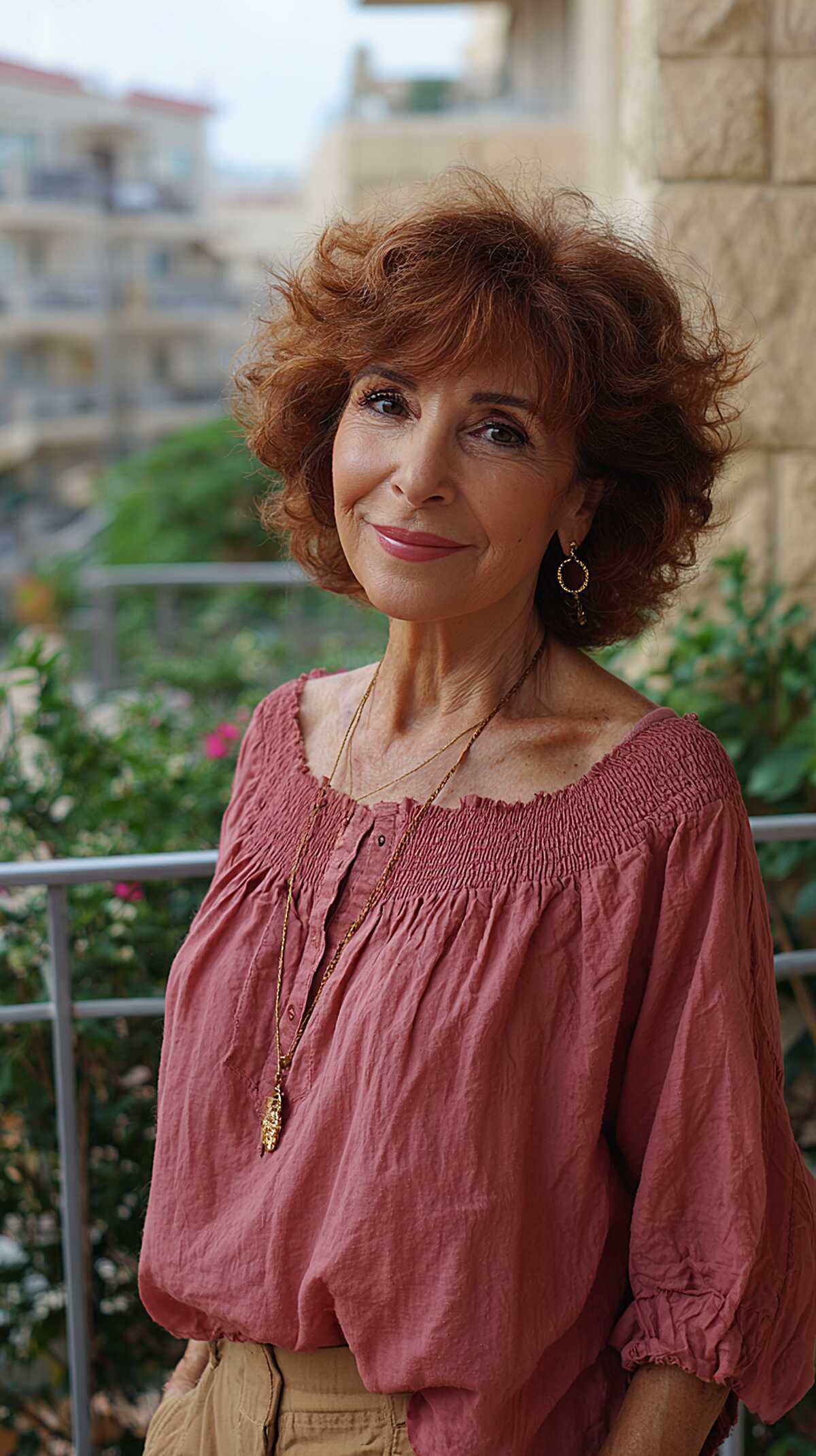 Short cinnamon-toned curly shag with soft volume