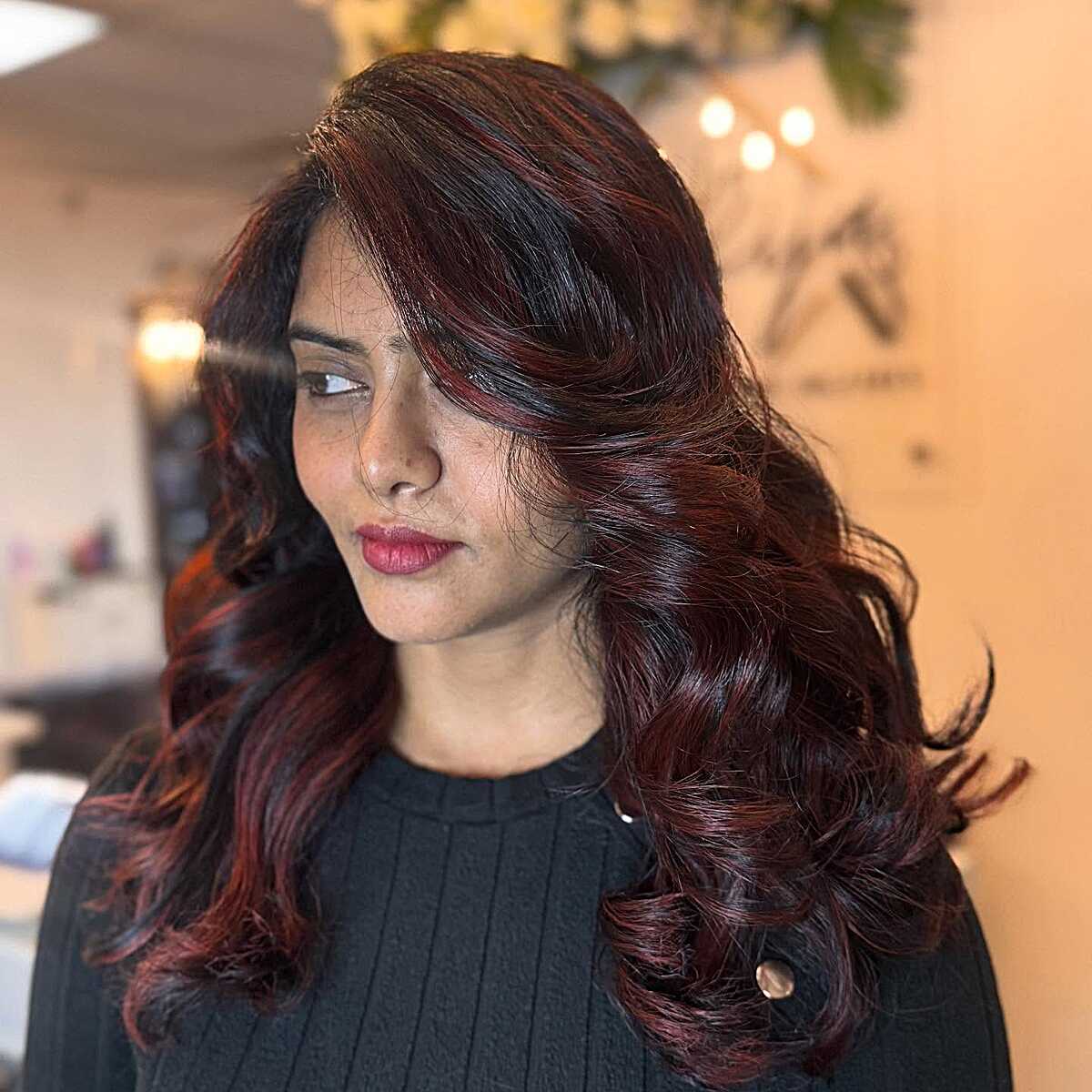 Long dark merlot brown curls with burgundy red highlights