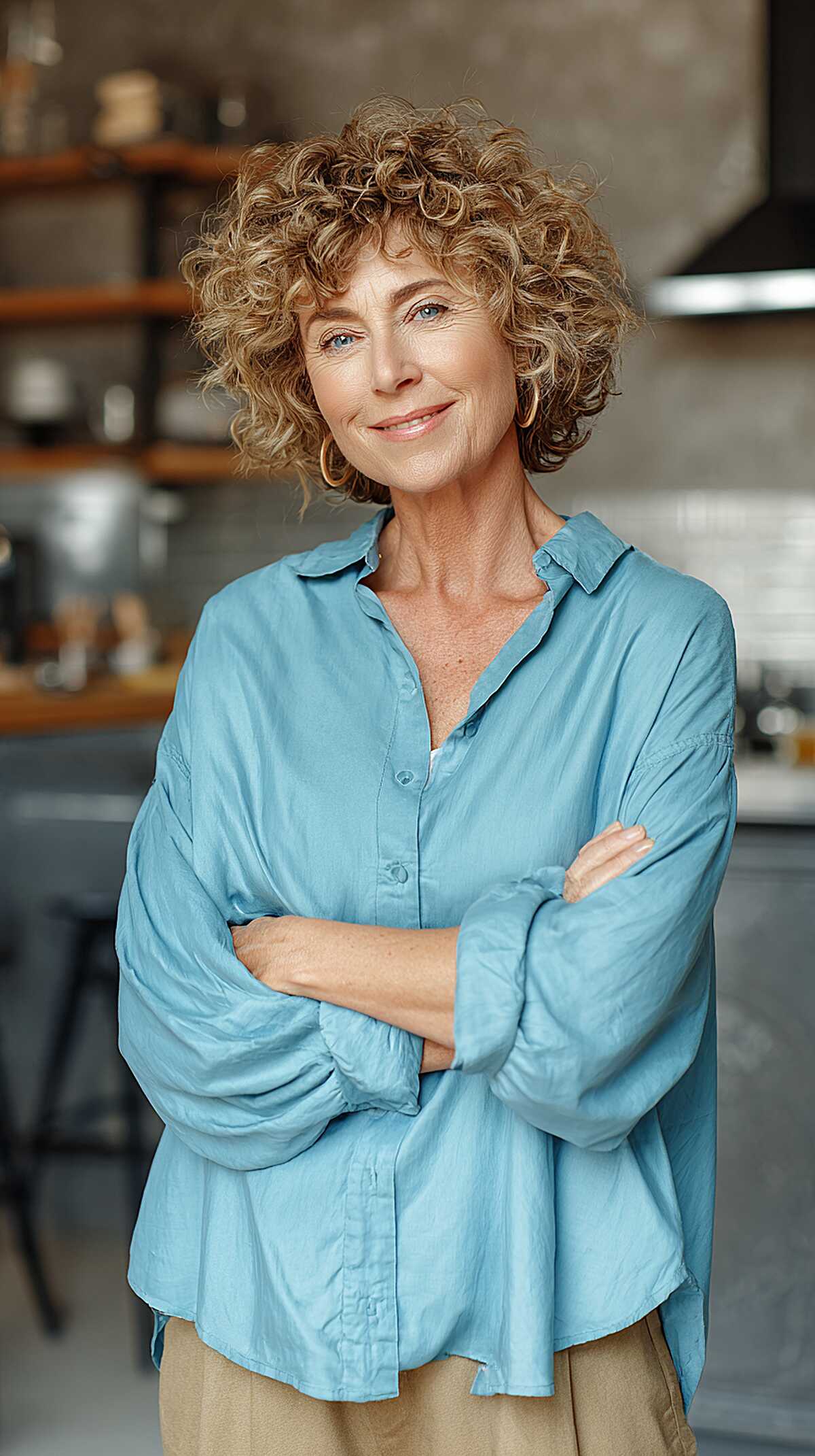 Honey blonde chin-length curly shag with full body