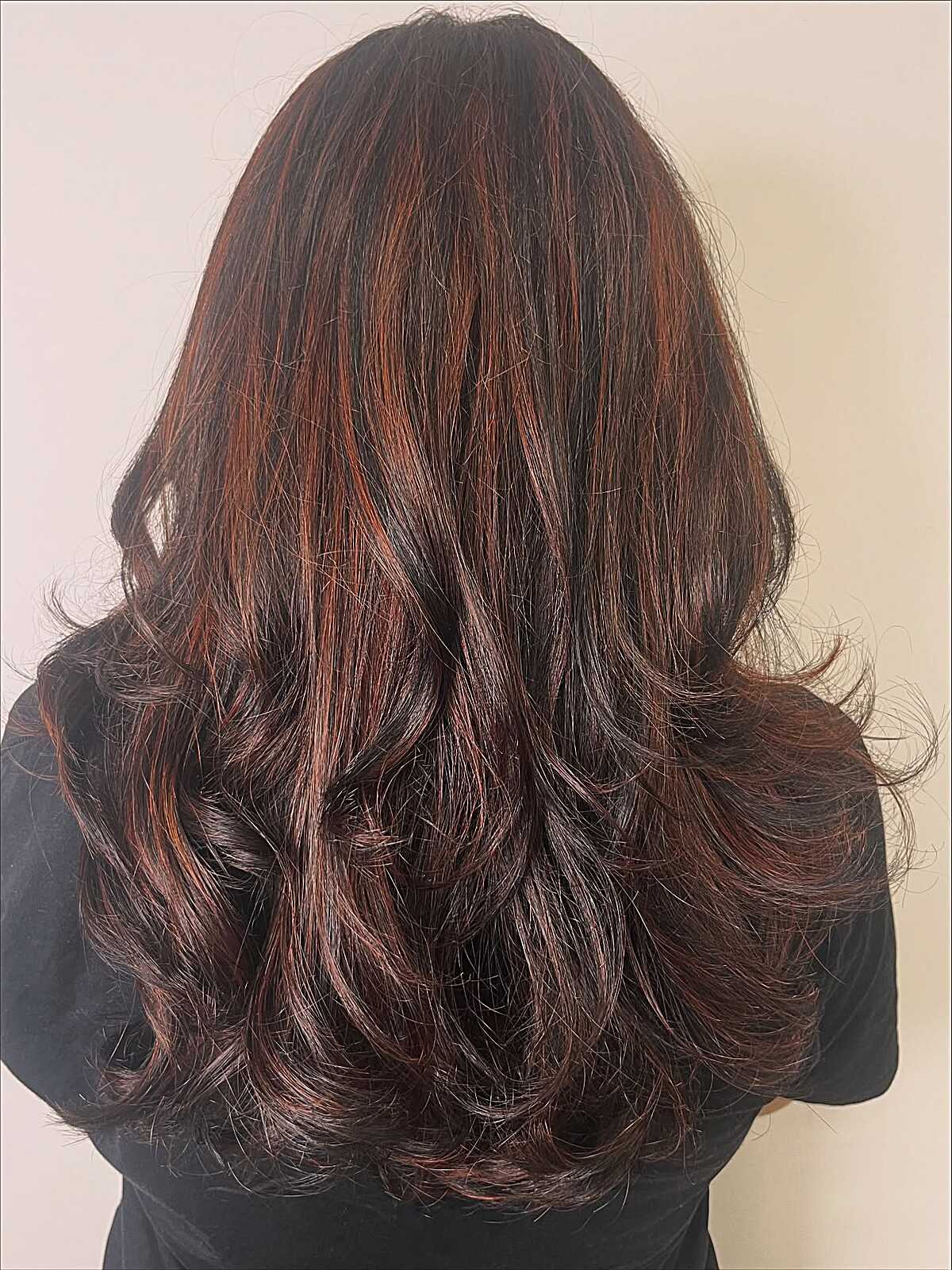 Long dark espresso brown hair with subtle copper highlights