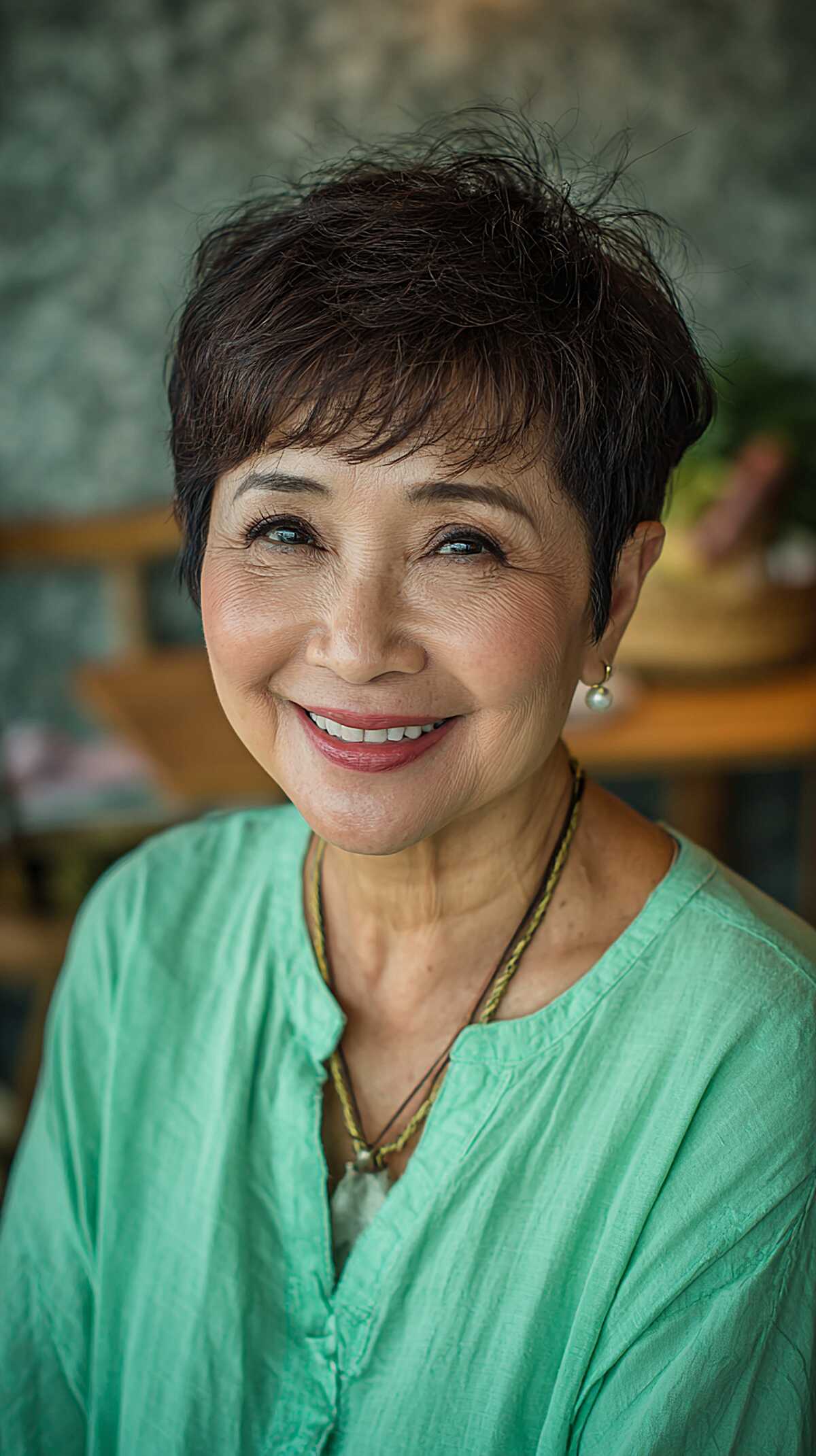Textured dark brunette pixie with feathery finish