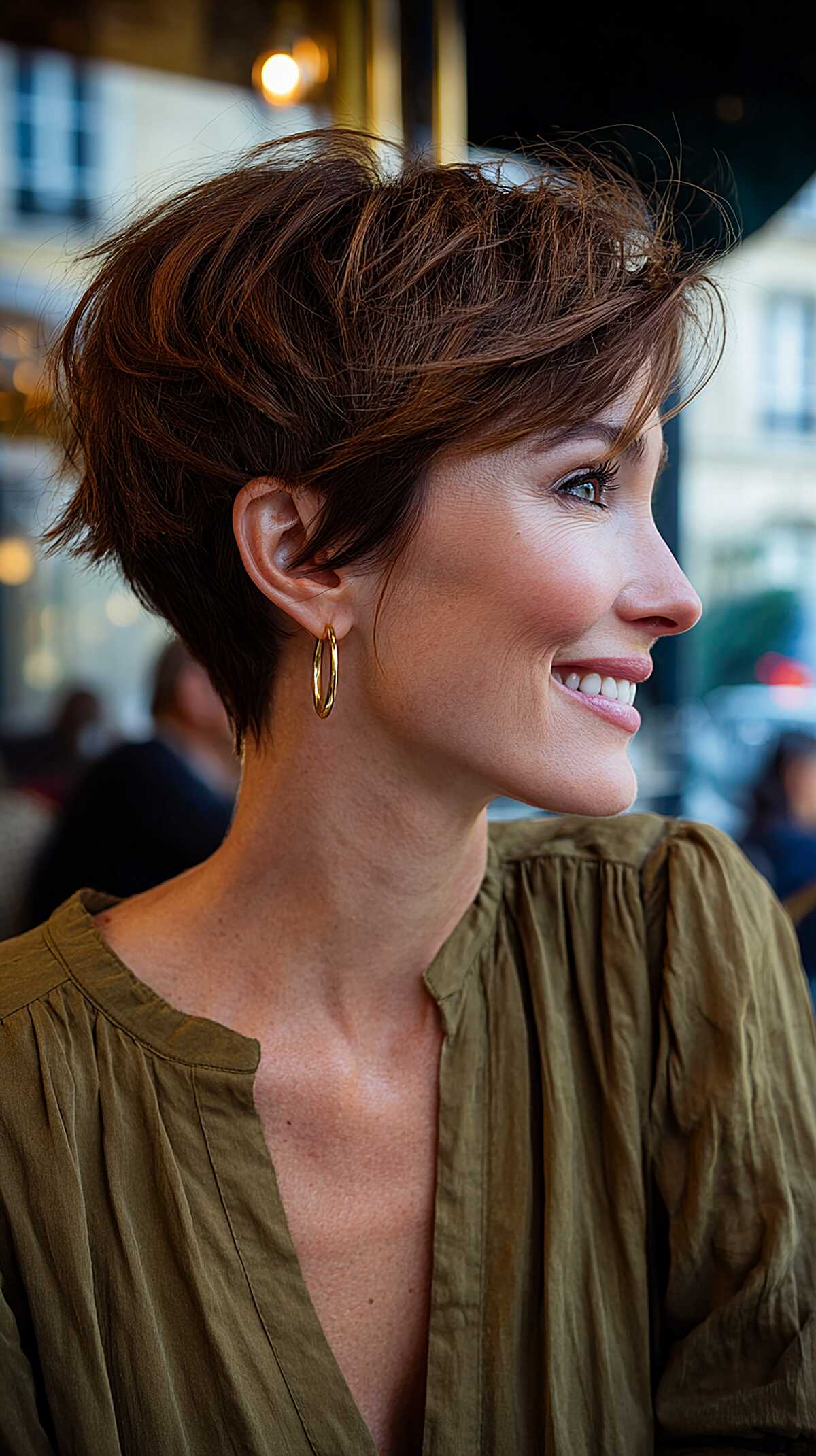 Chestnut brown angled pixie with volume at the crown