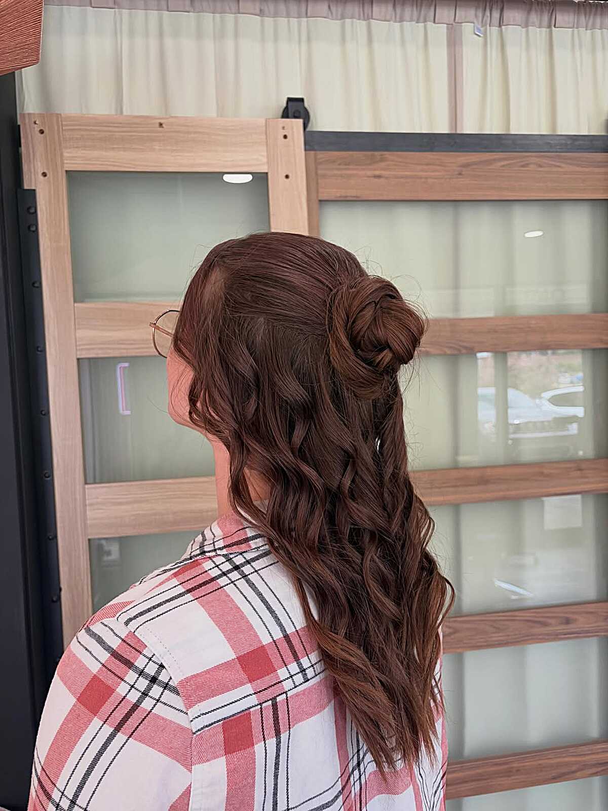 Copper Half Up Bun with Soft Curls Below
