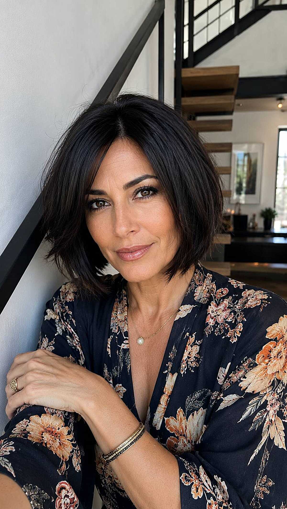 Dark espresso textured chin-length bob with center part