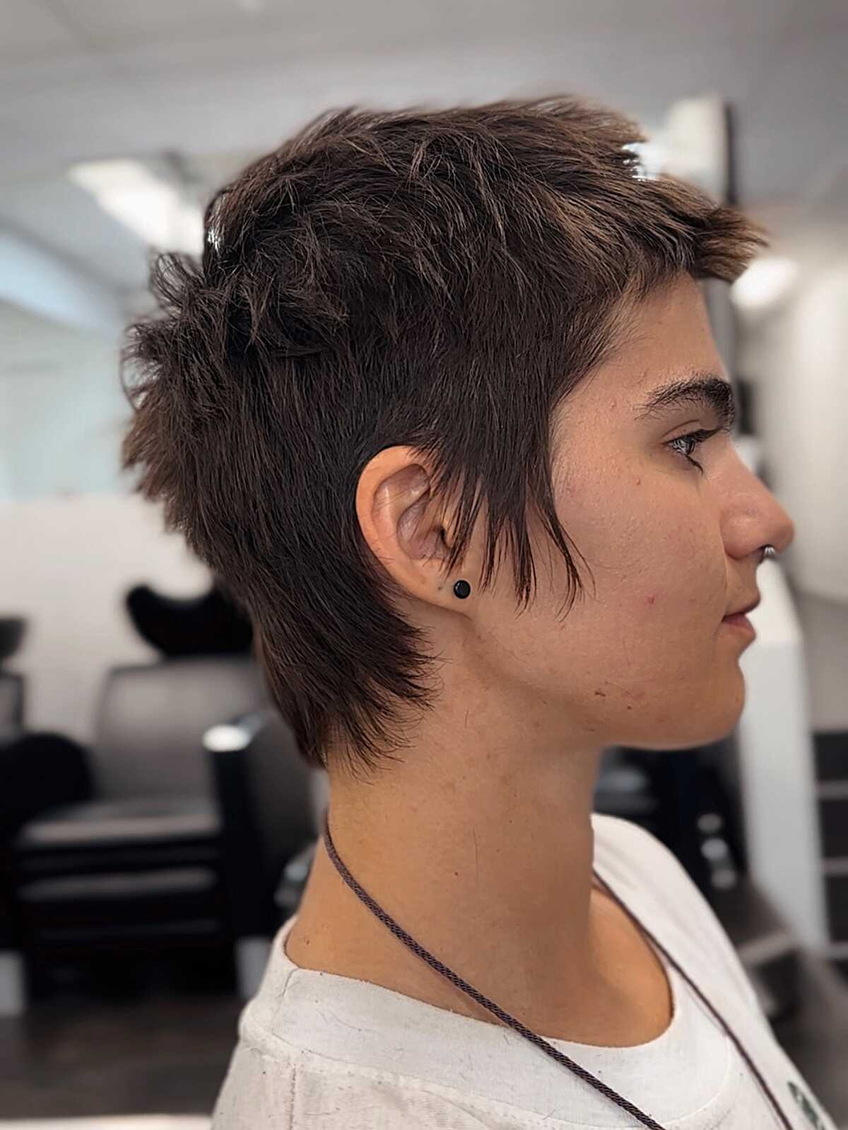 Short brown feathered mullet with textured layers