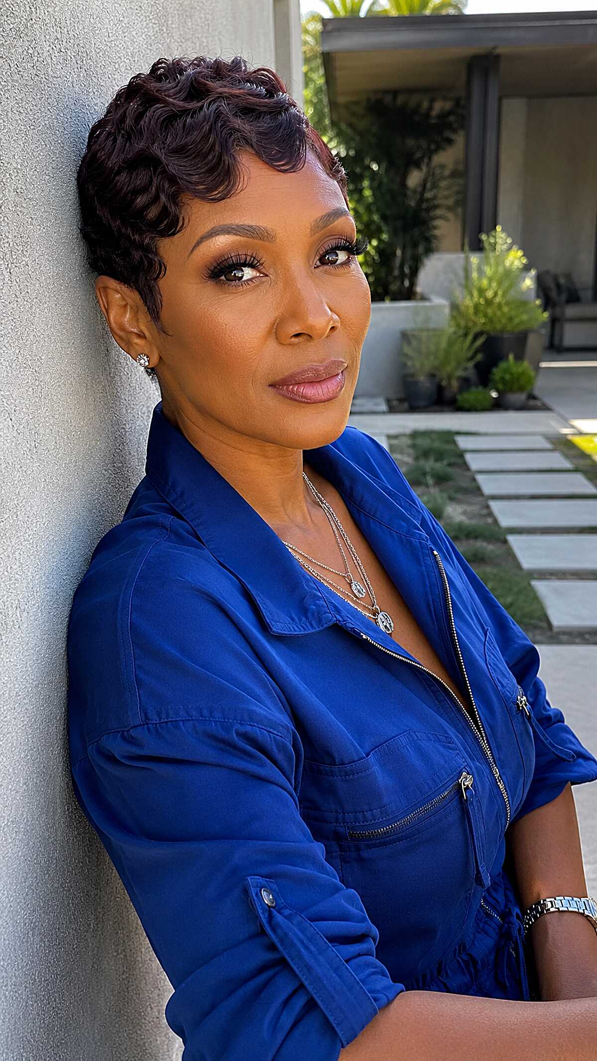 Short glossy finger waves pixie on black woman