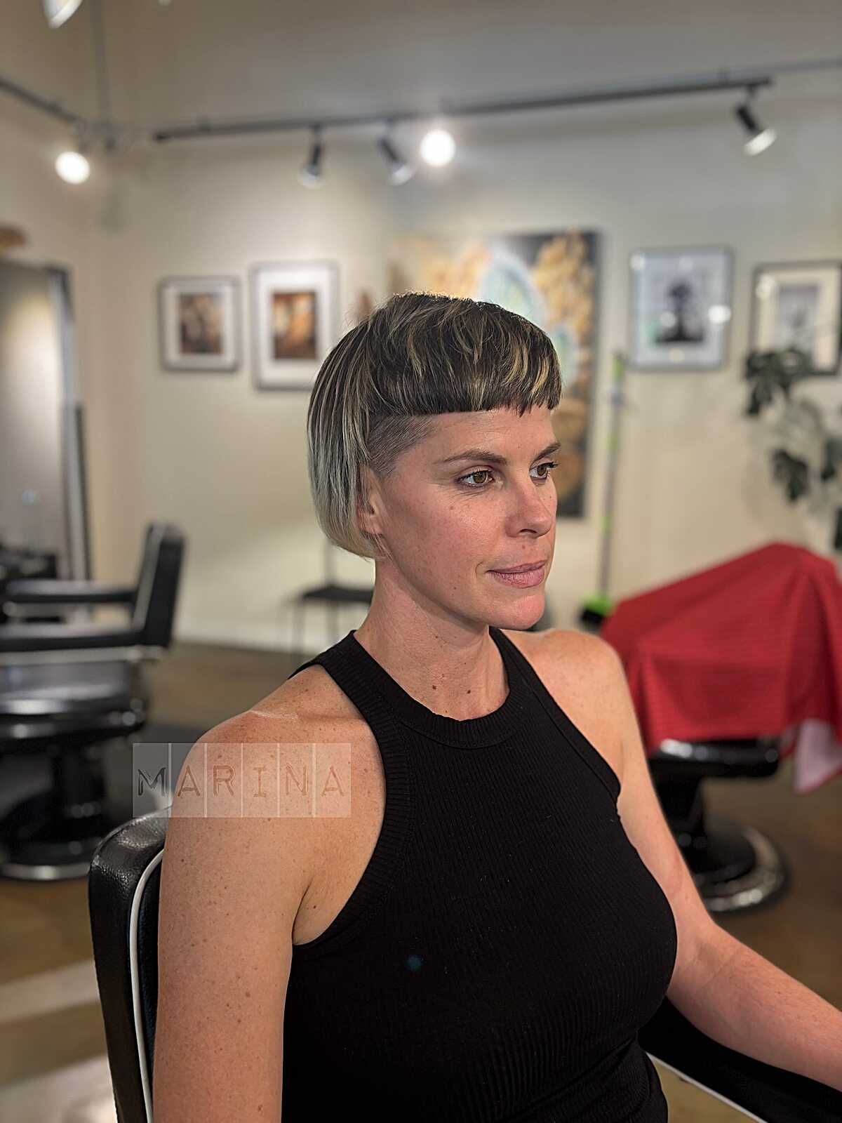 Blonde highlighted bowl cut with shaved undercut