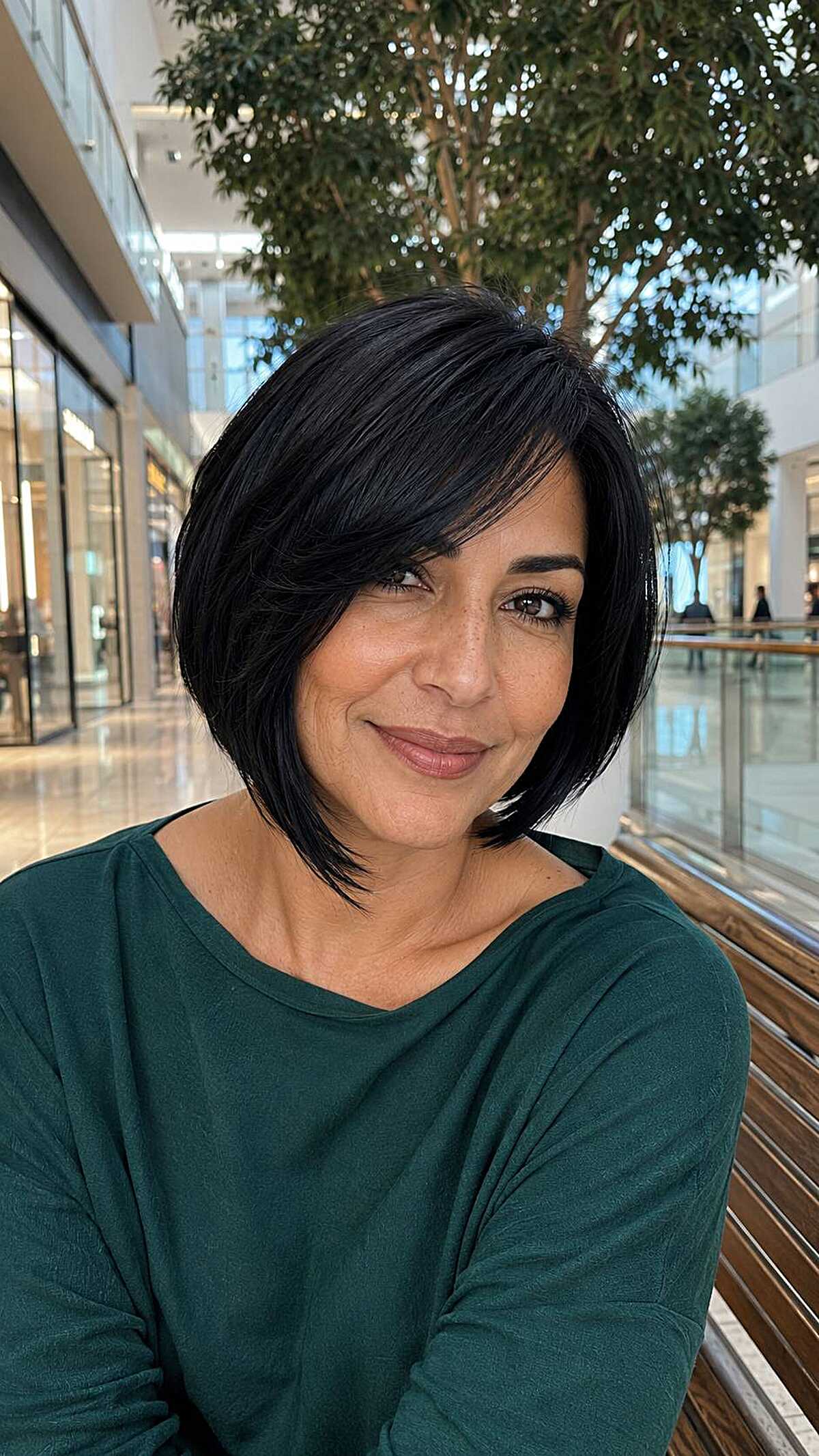 Jet black sleek inverted chin-length bob