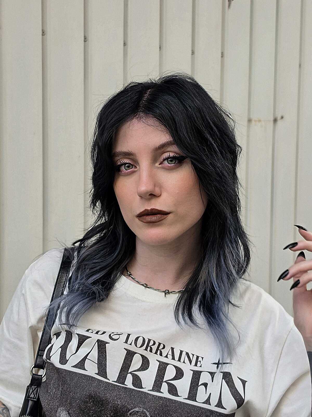 Black layered shag with steel blue tips and side part