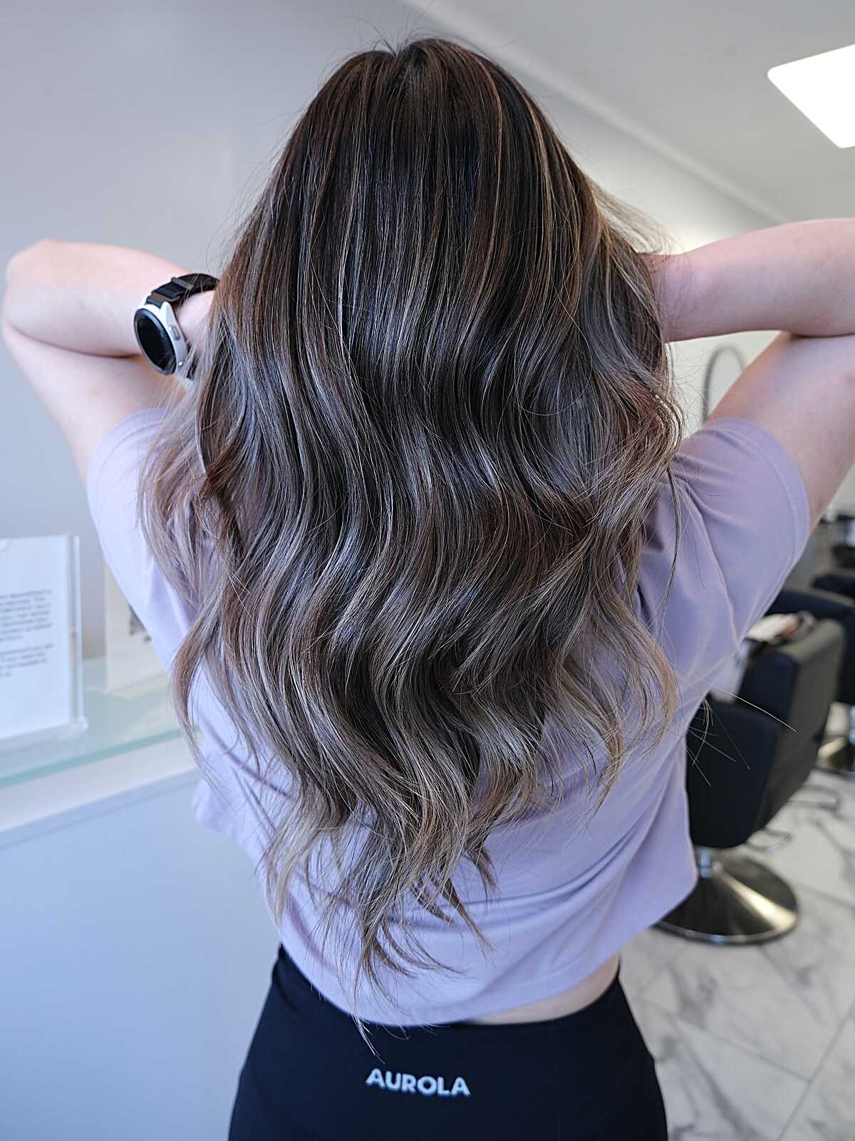 Dark hair with mushroom ash babylights and soft waves
