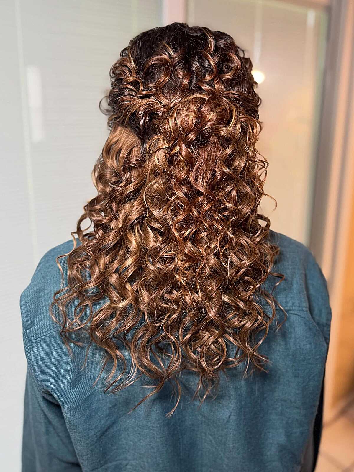 Natural Copper Curls Gathered in a Half Up Style