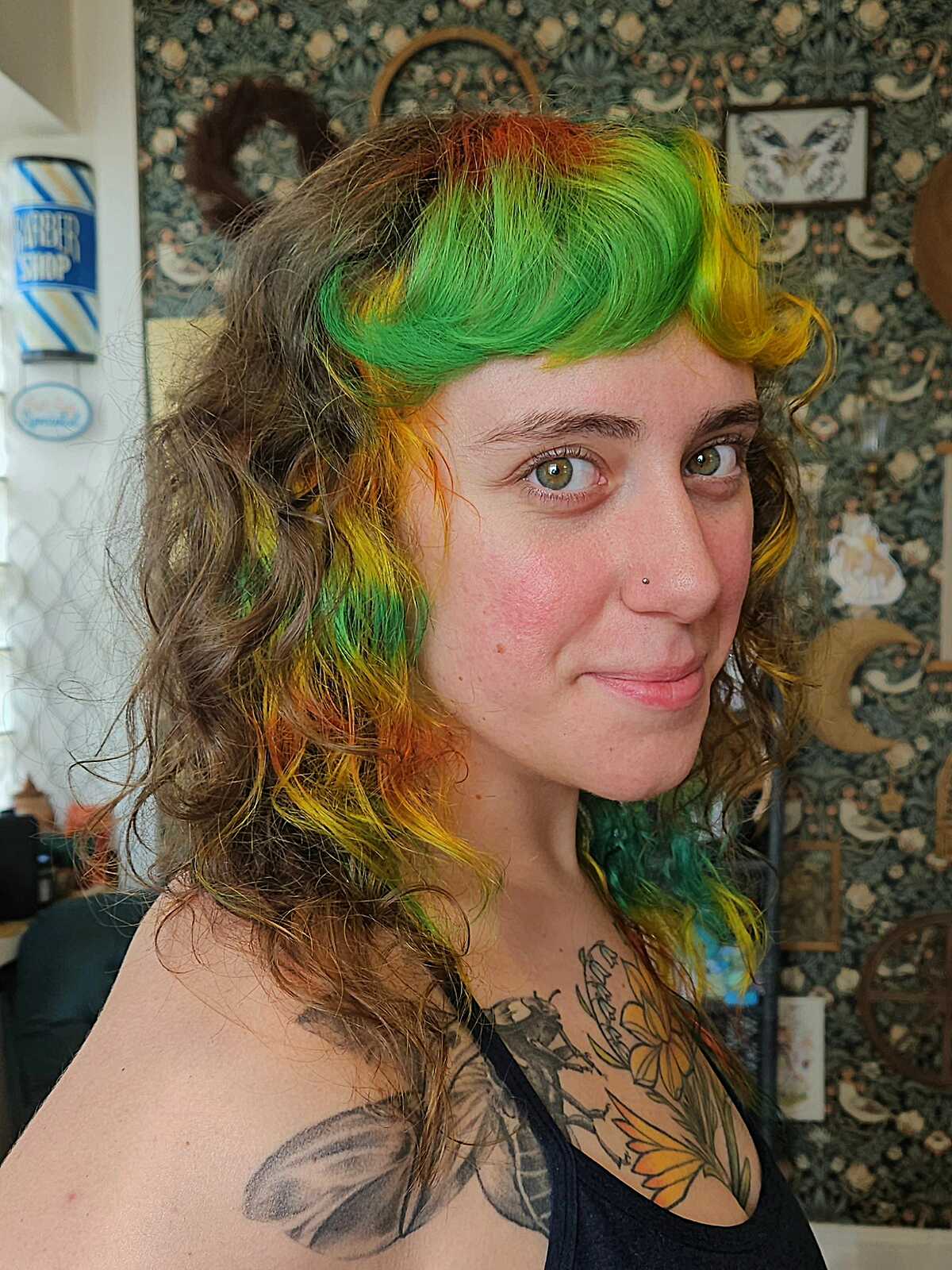 Curly shag with green, yellow, and orange rainbow bangs