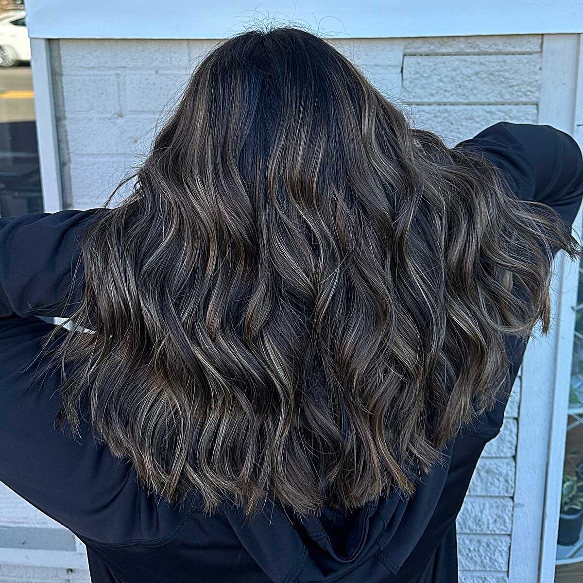 Textured dark wavy lob with scattered ash babylights