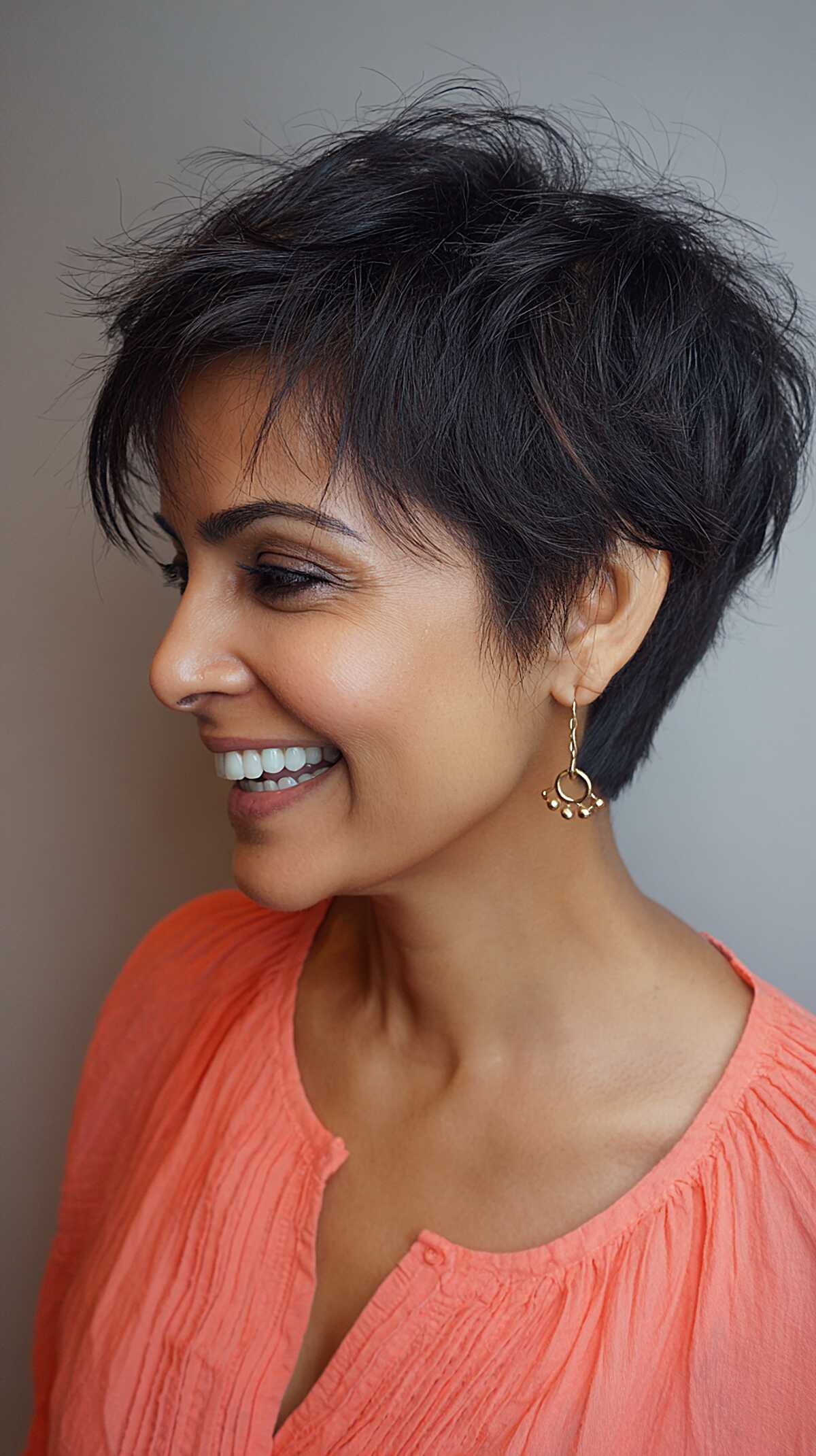 Shaggy black angled pixie with feathered textured ends