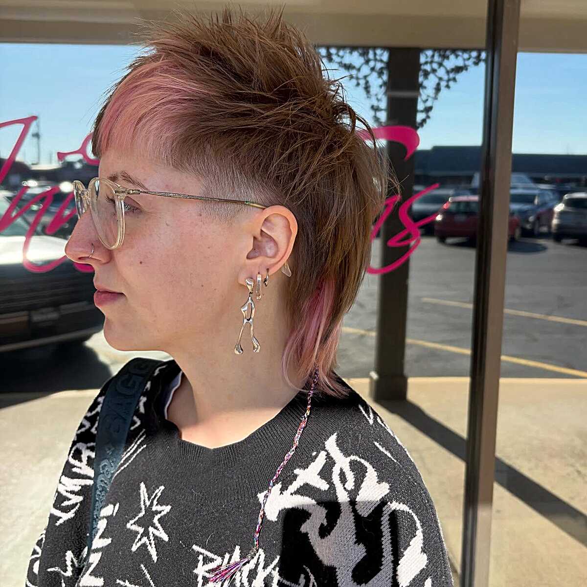 Side view of spiked shag with buzzed sides and pink tips