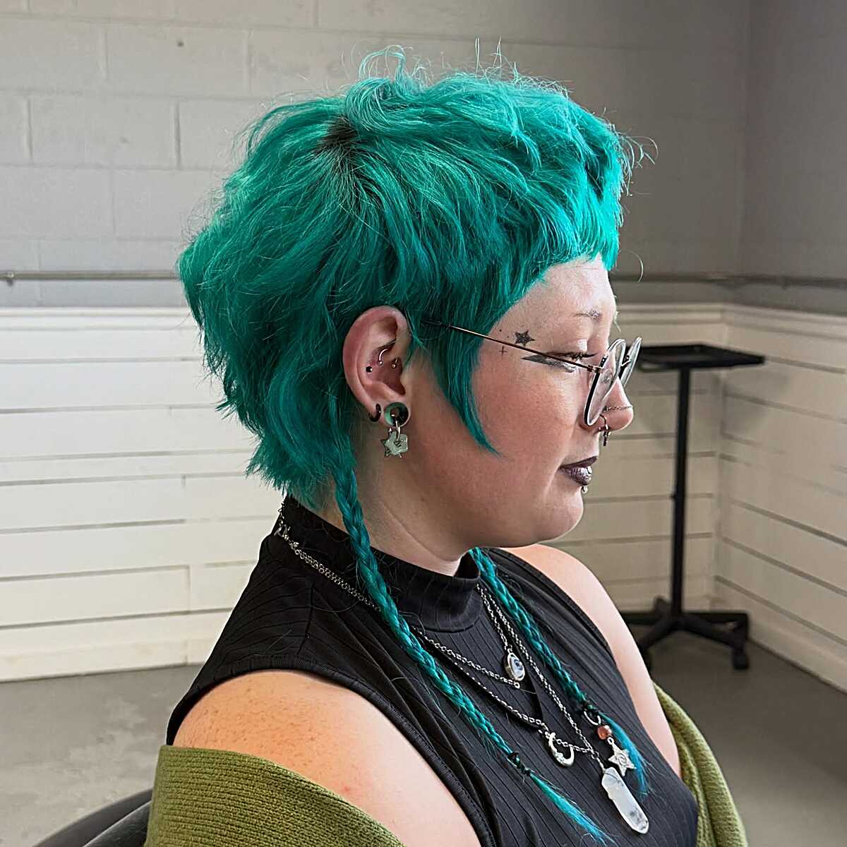 Bright teal pixie shag with thin braided rat tails