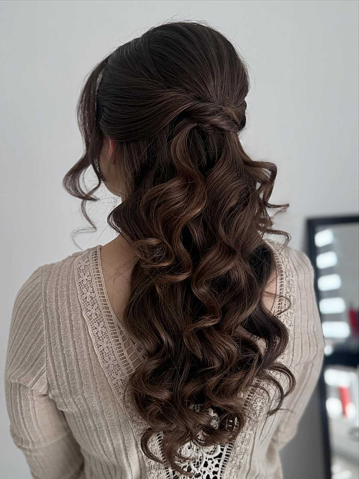 Volume Lifted Crown with Soft Brown Waves Half Up