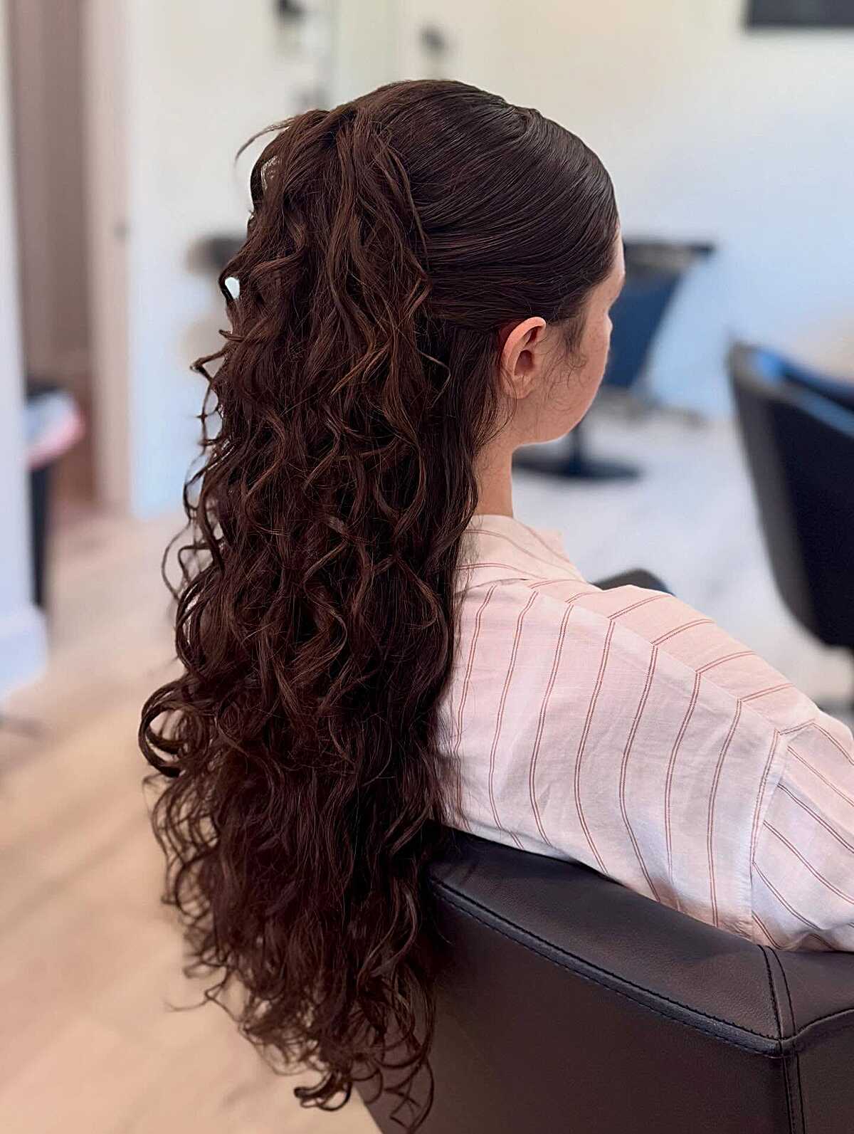 Voluminous Half Up Ponytail on Deep Curls