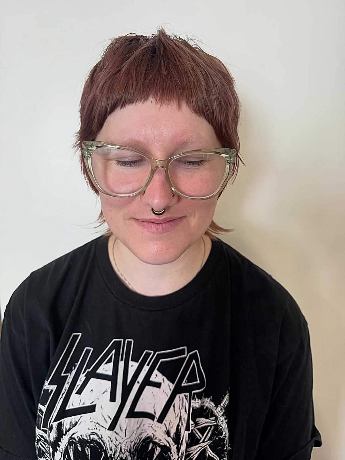 Warm copper short textured crop with choppy bangs