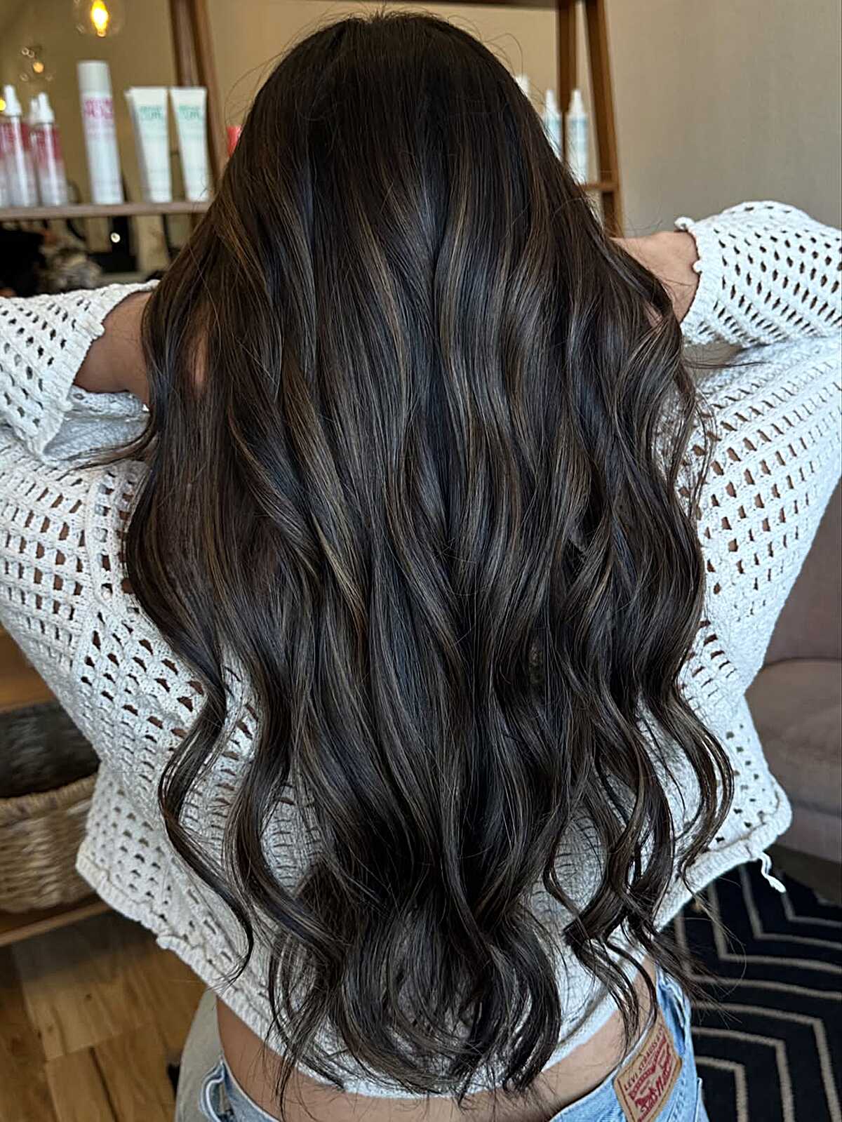 Long dark curly hair with smoky ash babylights
