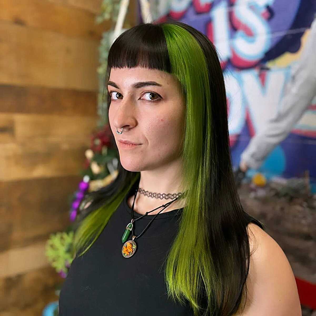 Long straight black hair with bright green peekaboo panels
