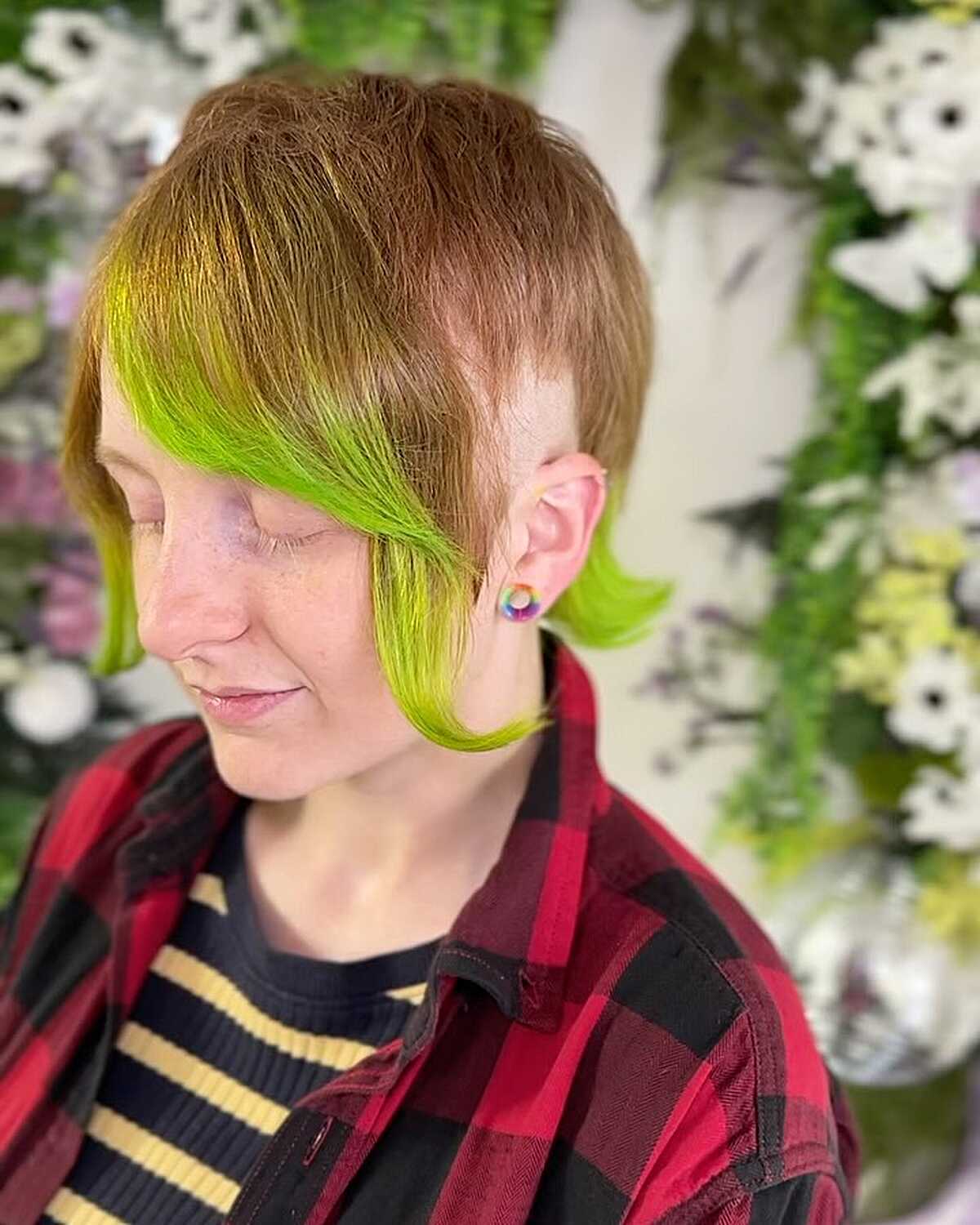 Short copper pixie with neon green tips at the ends