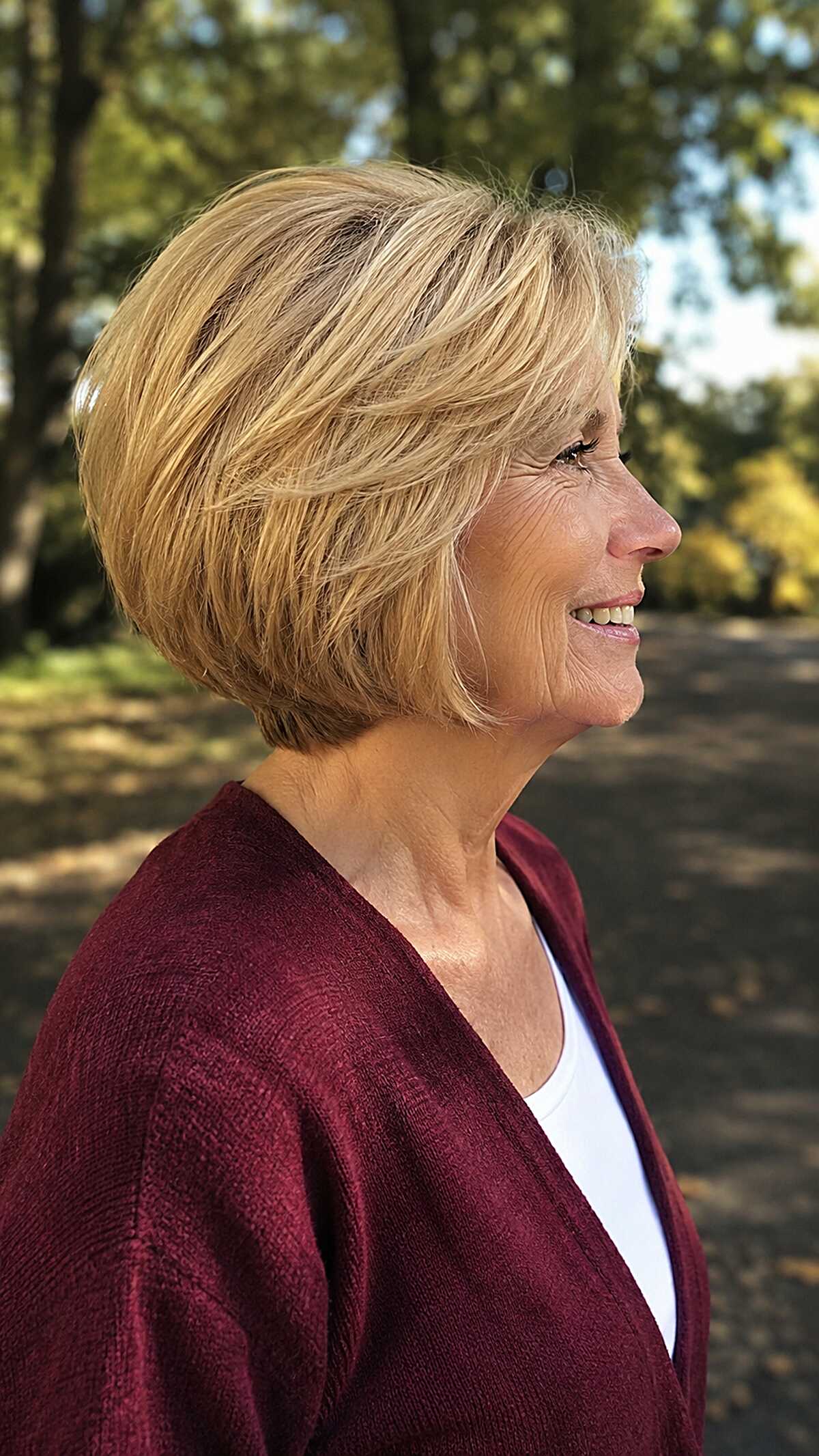 Golden blonde feathered angled bob with soft layers