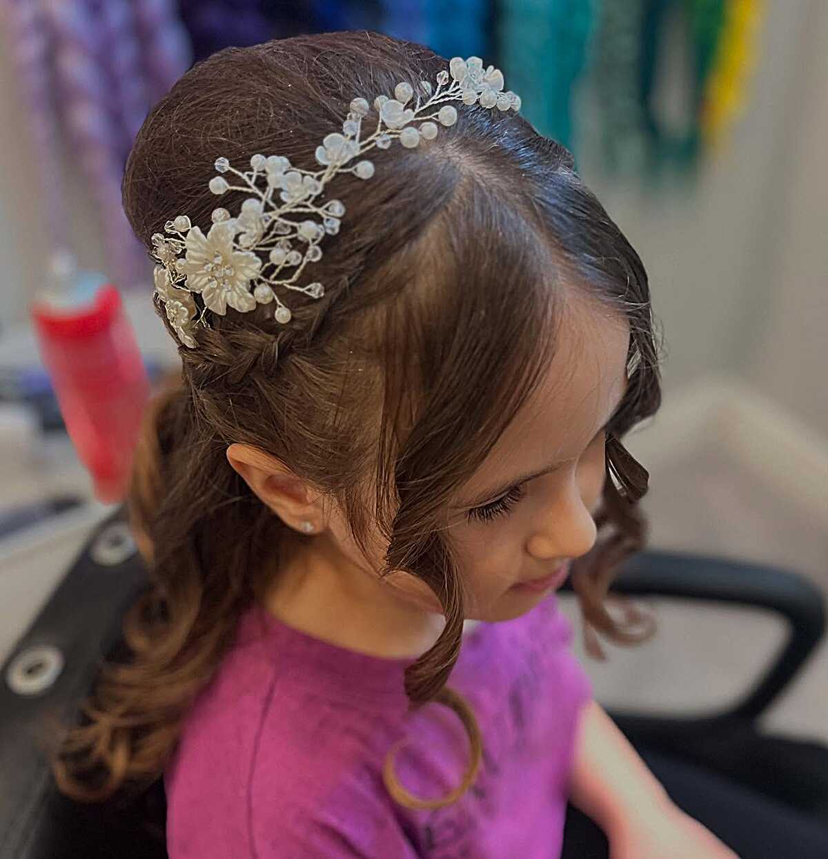 Half-up style with pearl vine headpiece and soft ringlets