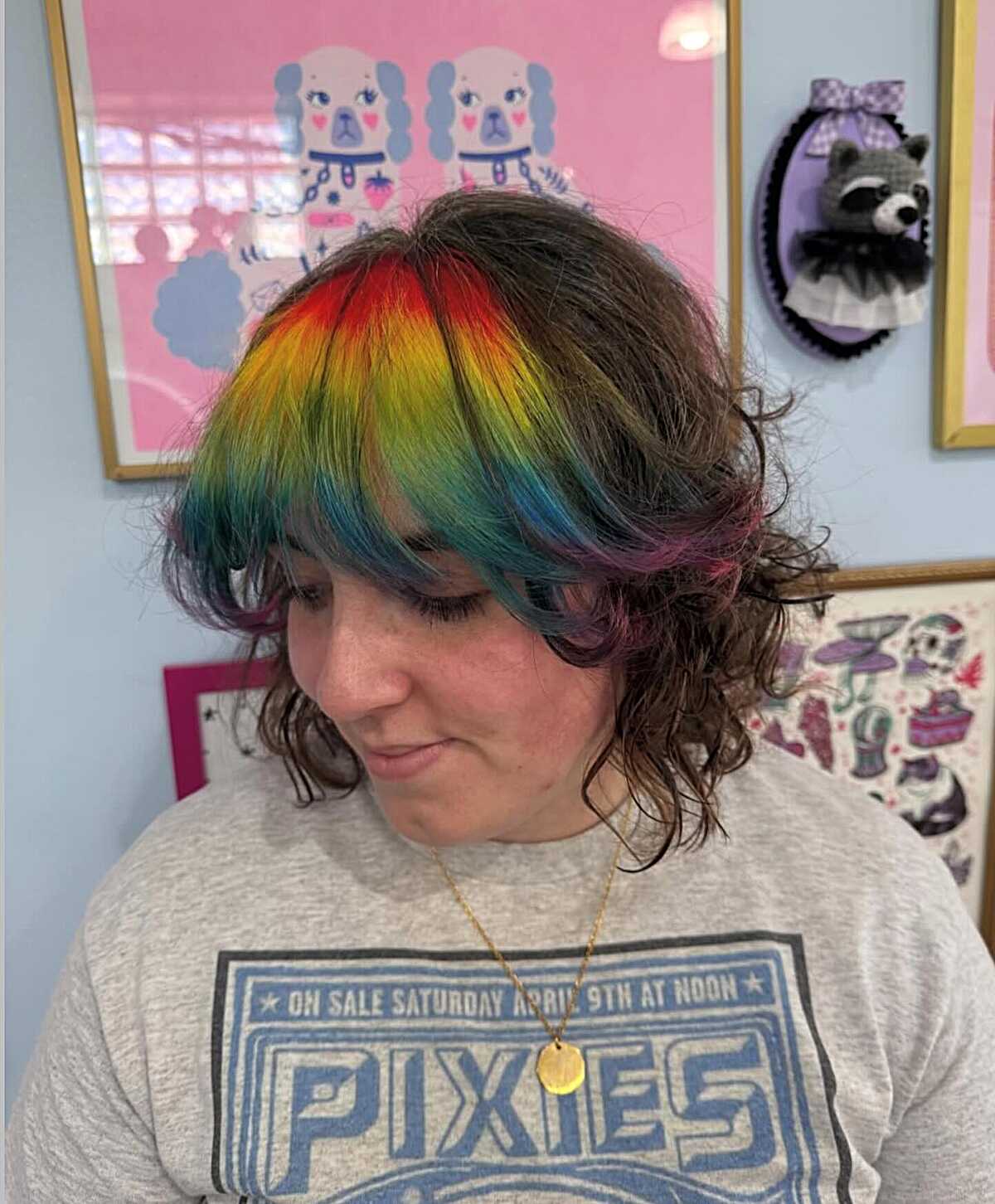Curly brown shag with rainbow-colored bangs