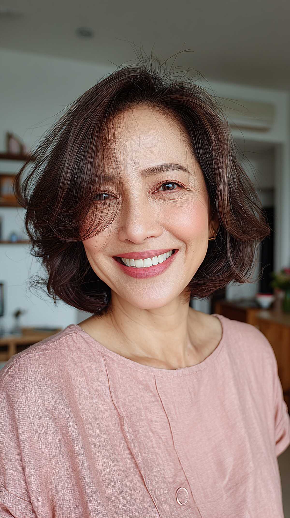 Tousled Voluminous Chin-Length Bob with Deep Part