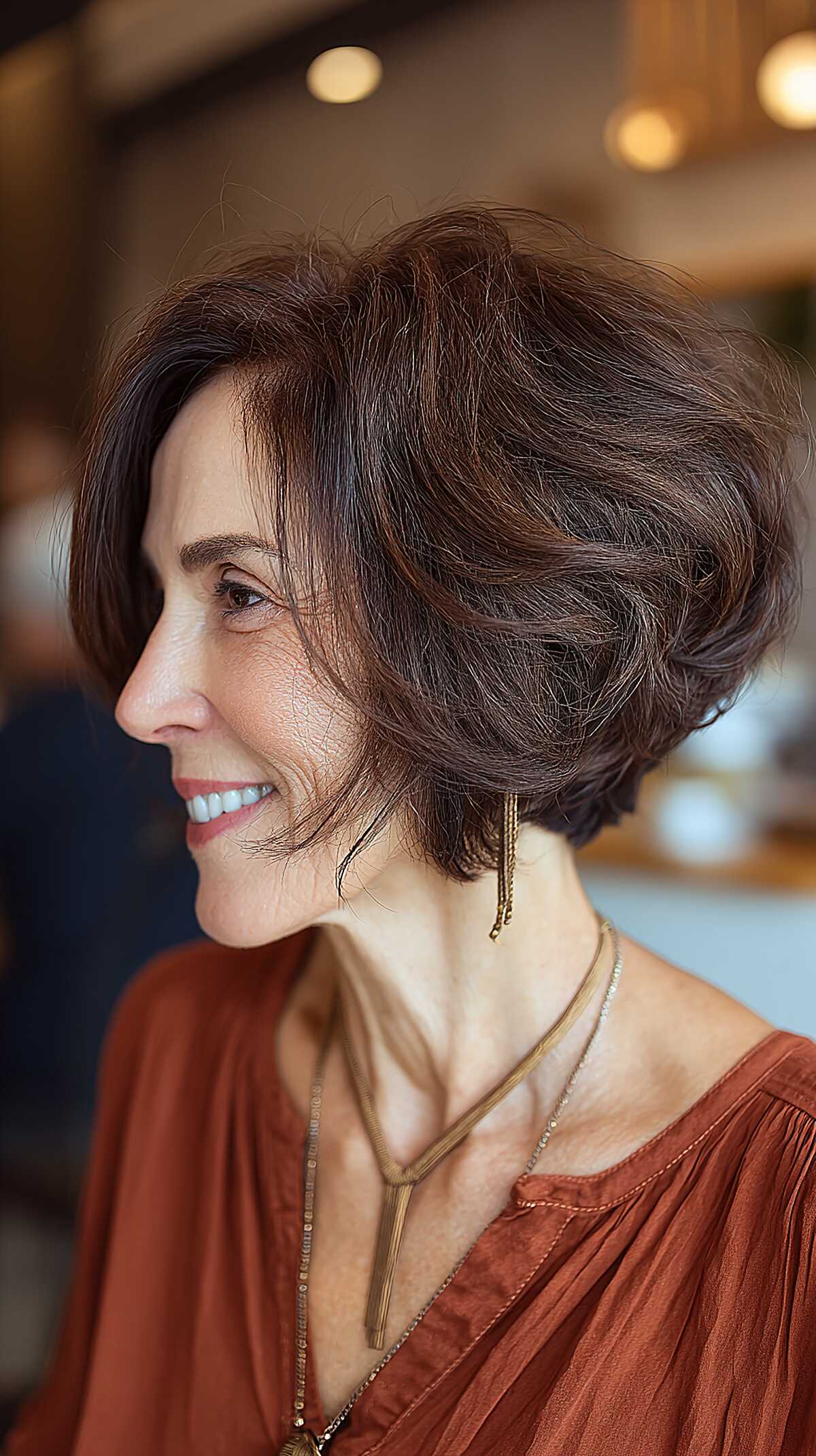 Voluminous dark chocolate bob with flipped-out ends