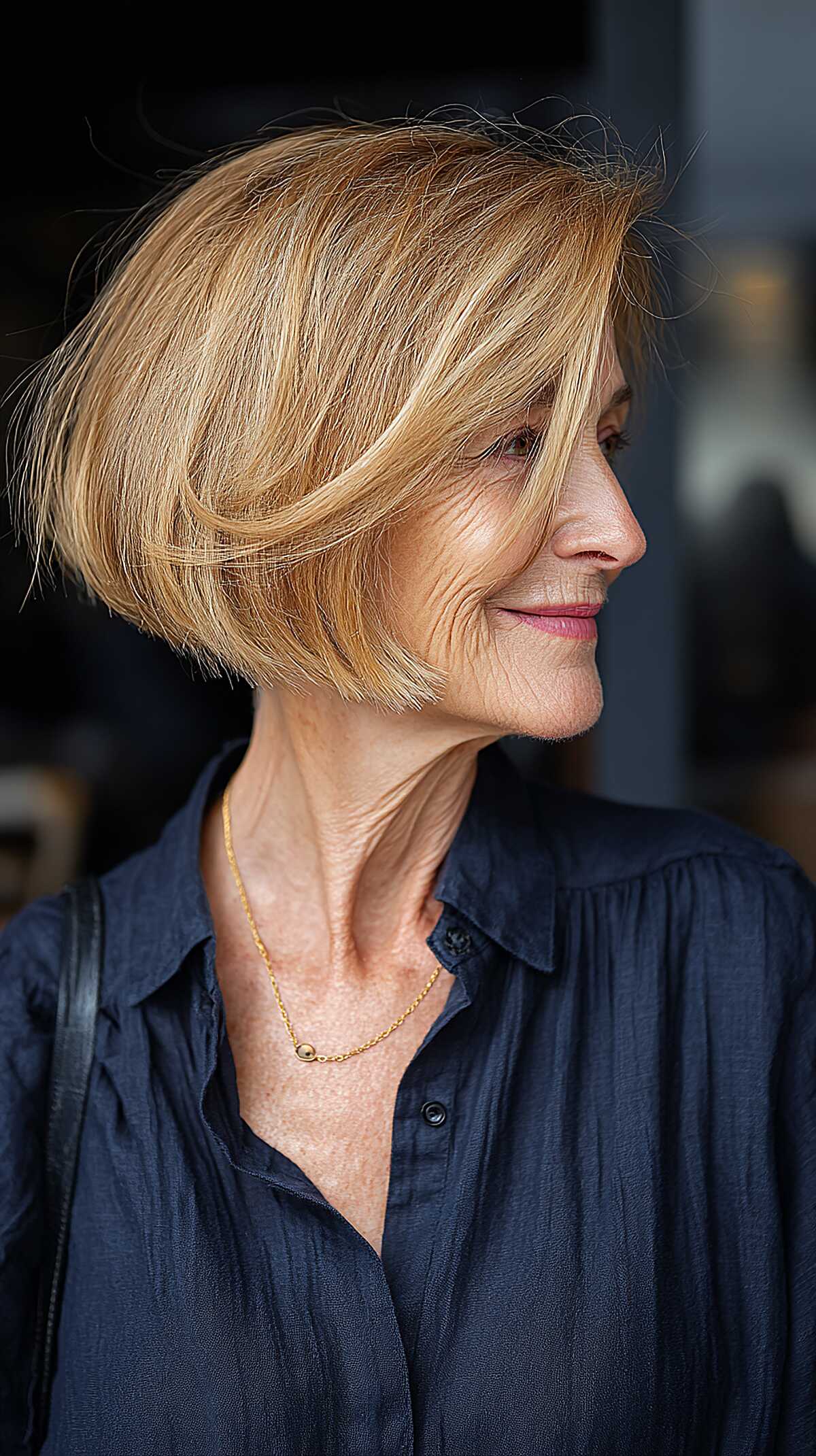 Warm honey blonde chin-grazing angled bob