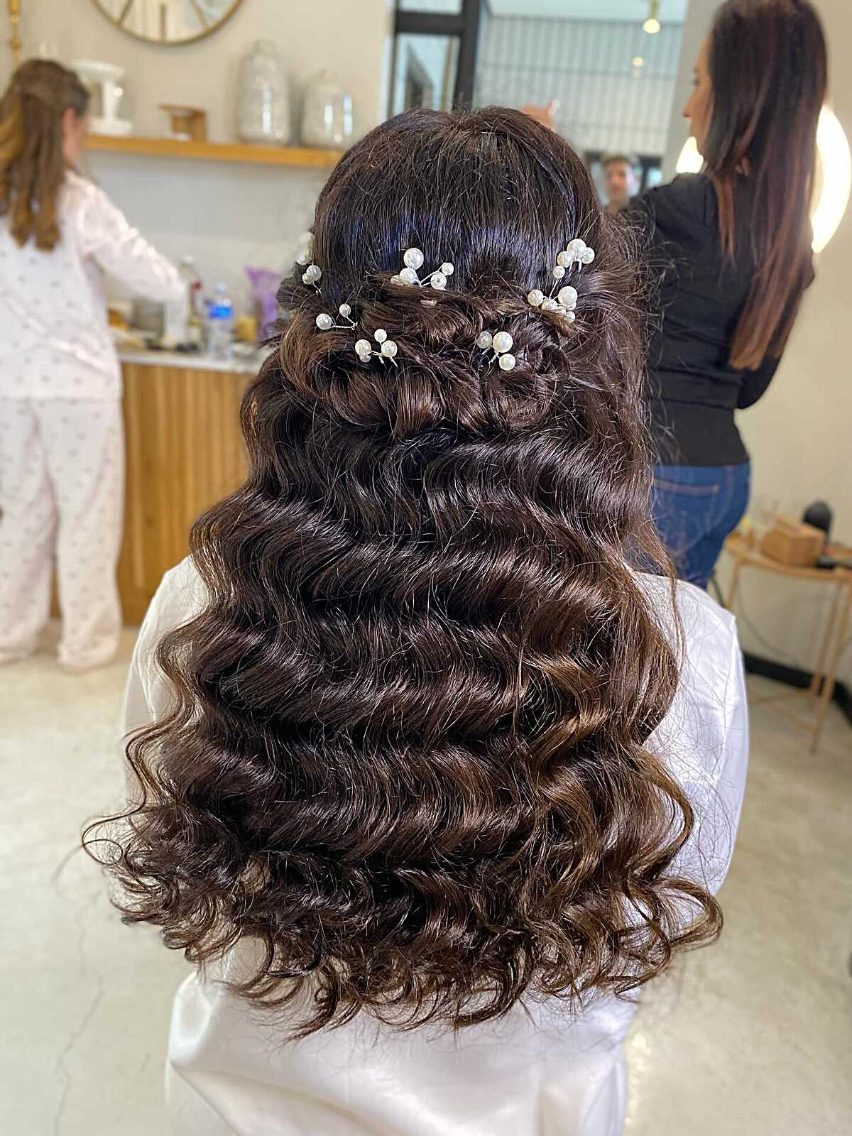 Dark crimped wave half up with pearl sprig pins
