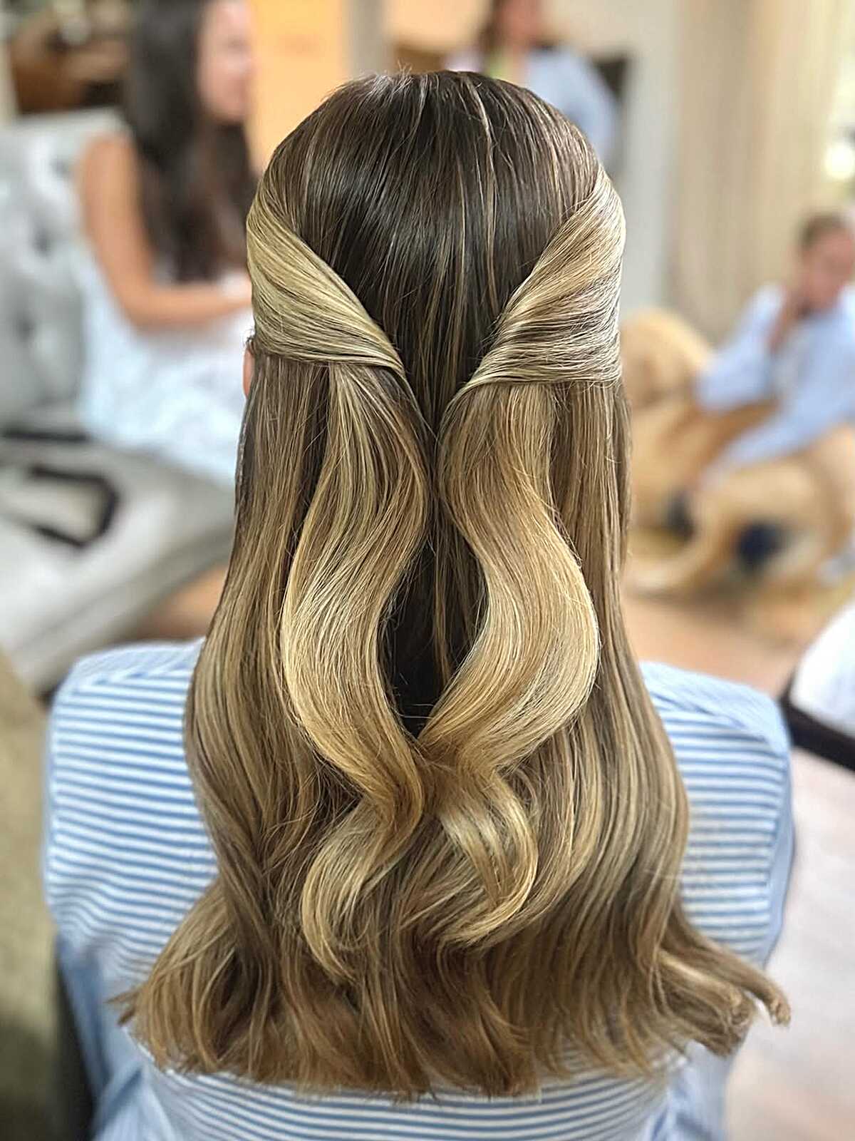 Silky balayage half up with crossed sections