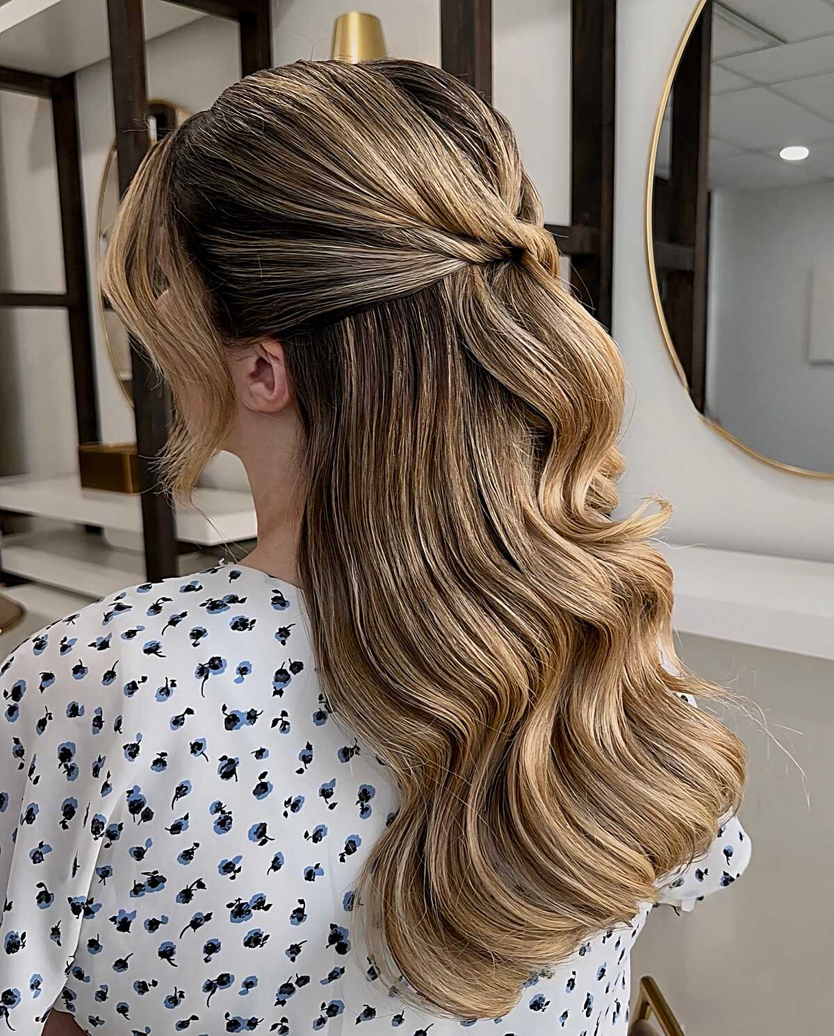 Highlighted brunette half up with low twist