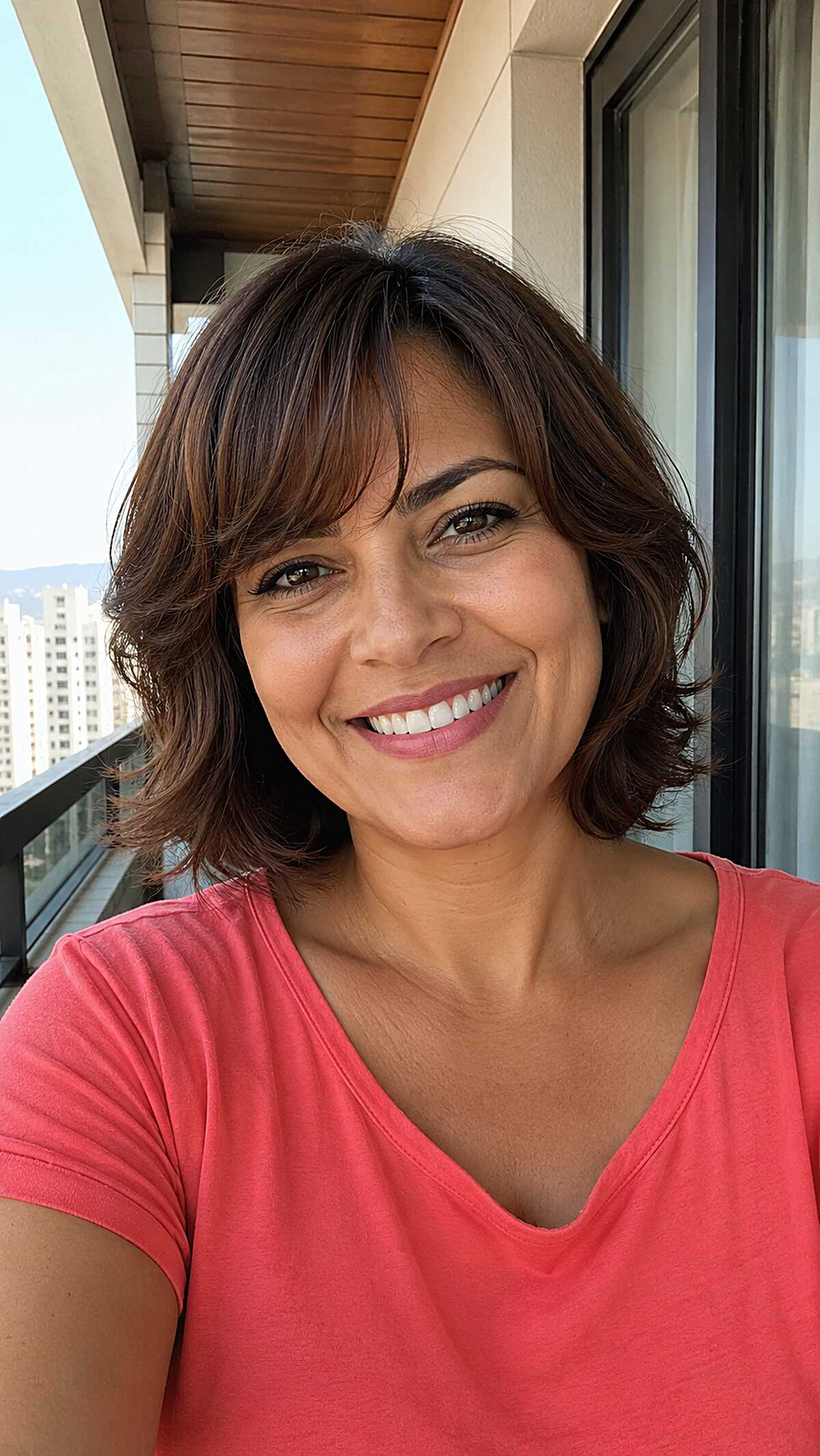 Layered chocolate brown bob with face-framing bangs