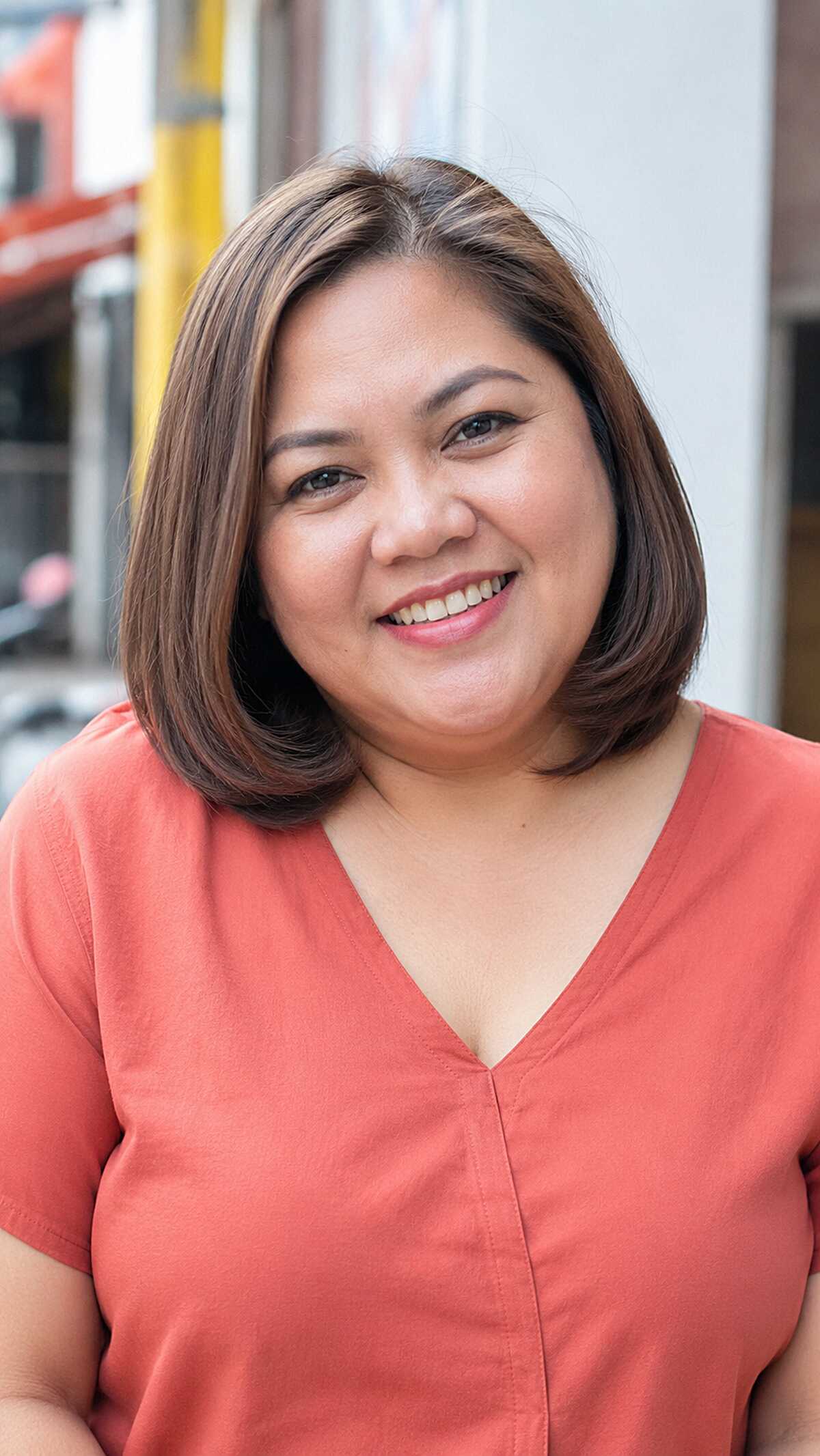 Sleek straight brown chin-length bob with subtle layers