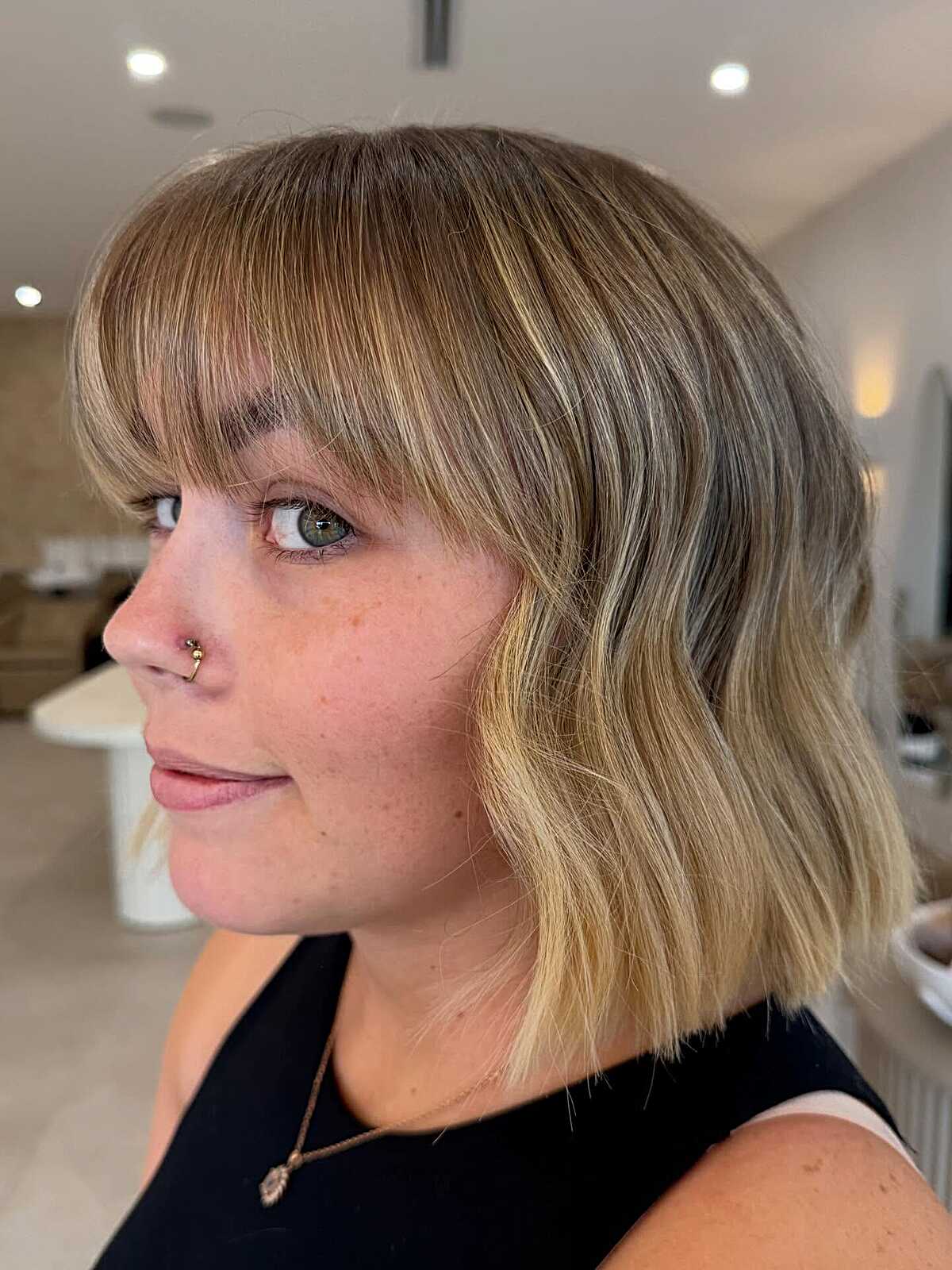 Bronde wavy blunt bob with soft wispy bangs