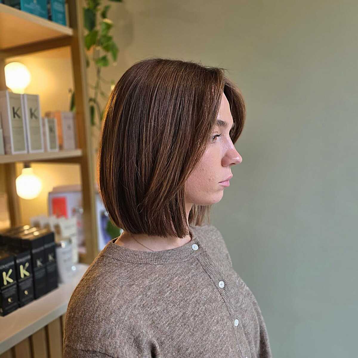 Medium chestnut brown blunt bob with soft inward ends