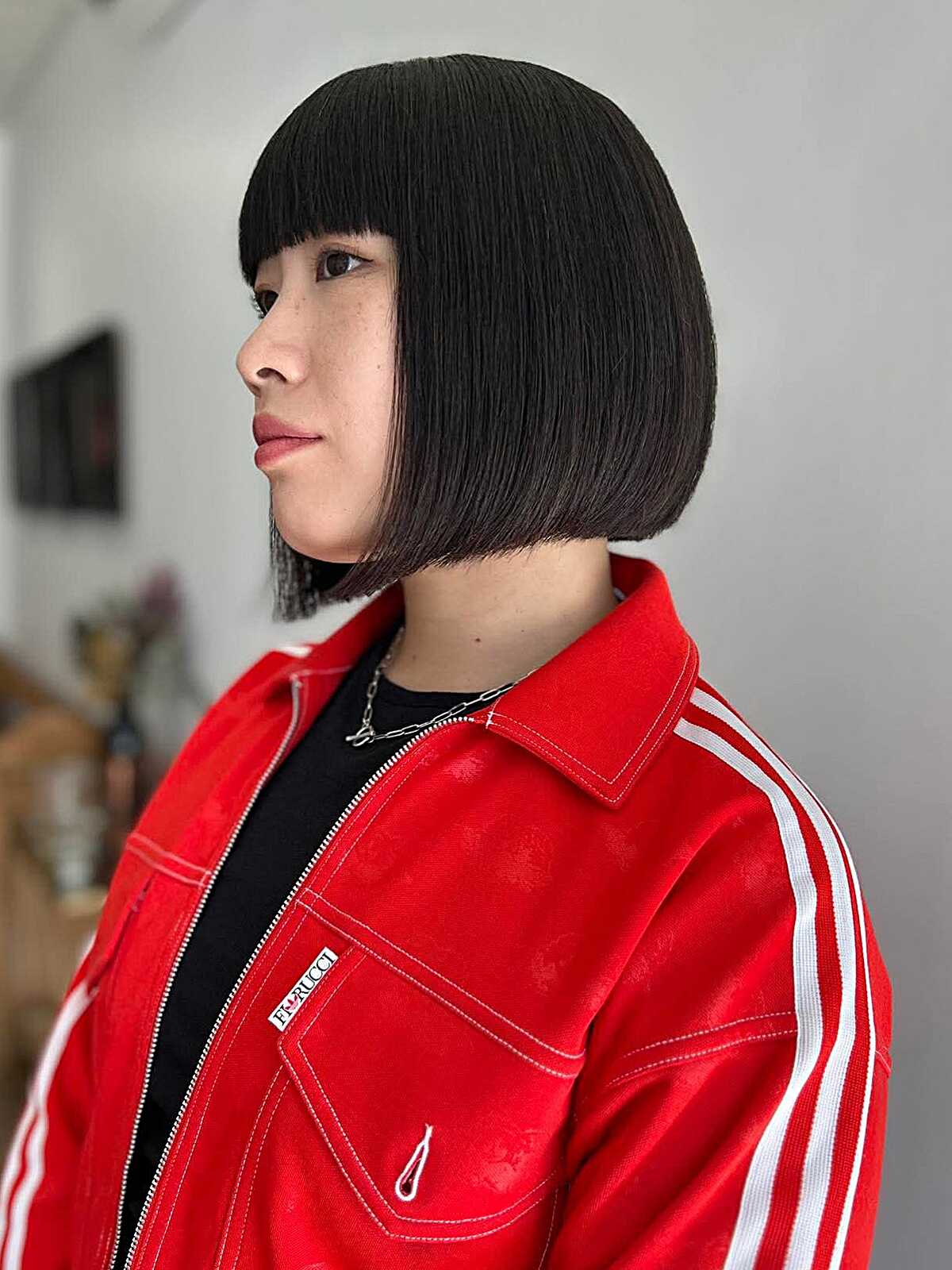 Black blunt bob with straight micro bangs